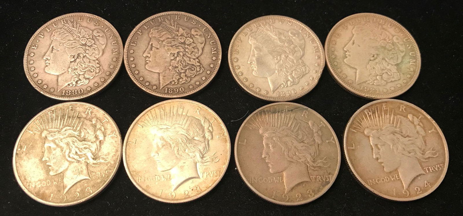 8 U.S. SILVER DOLLARS INCLUDING 1880, 1890O, 1896, AND (1 of 2)