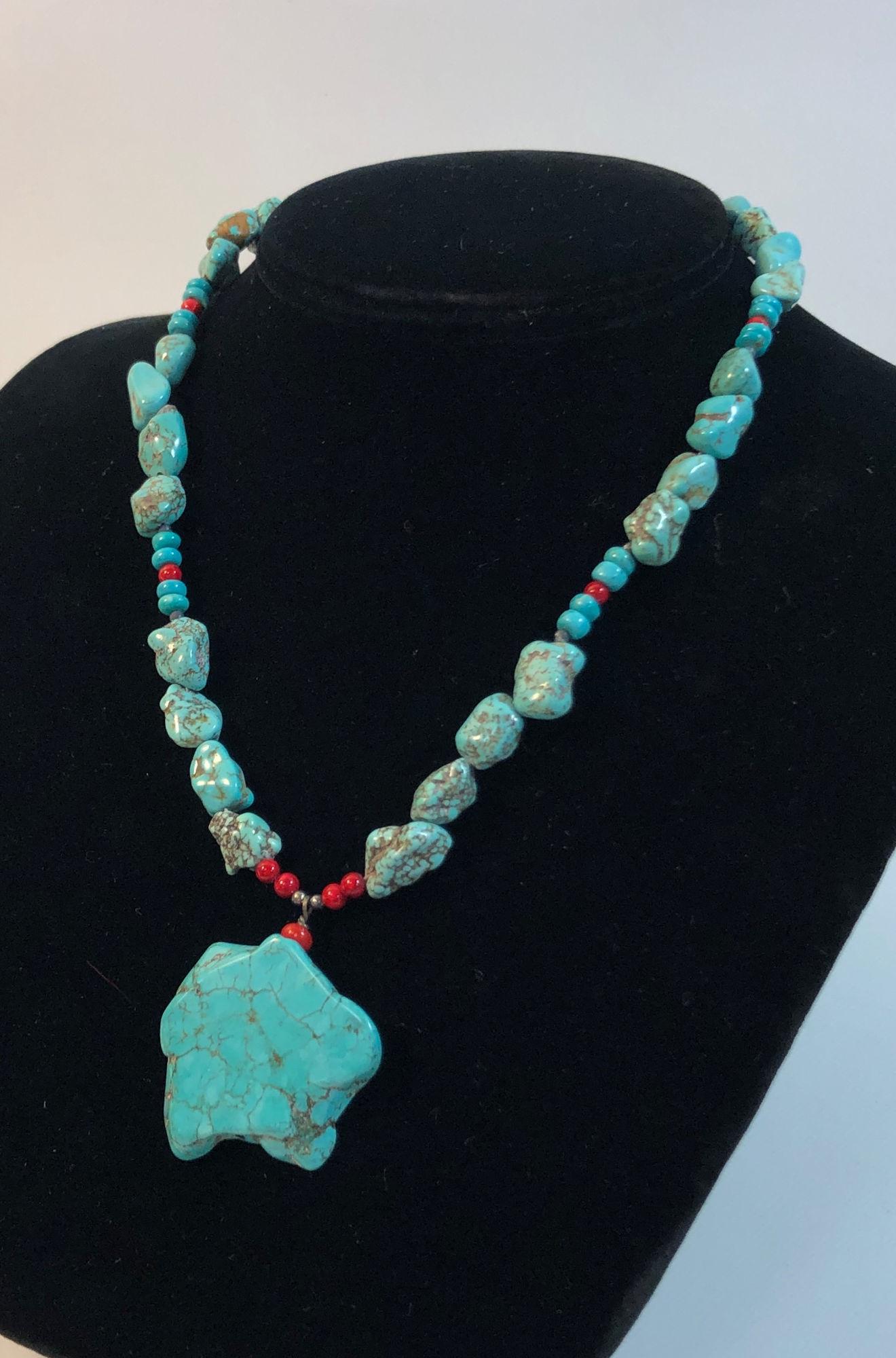 TURQUOISE & CORAL NECKLACE: TURQUOISE & CORAL NECKLACE ~ 16" CHOKER LENGTH TUMBLED TURQUOISE & CORAL BEAD NECKLACE W/ 1.5" TURQUOISE PENDANT *CORAL CAN ONLY BE SHIPPED TO BUYERS WITHIN THE UNITED STATES*