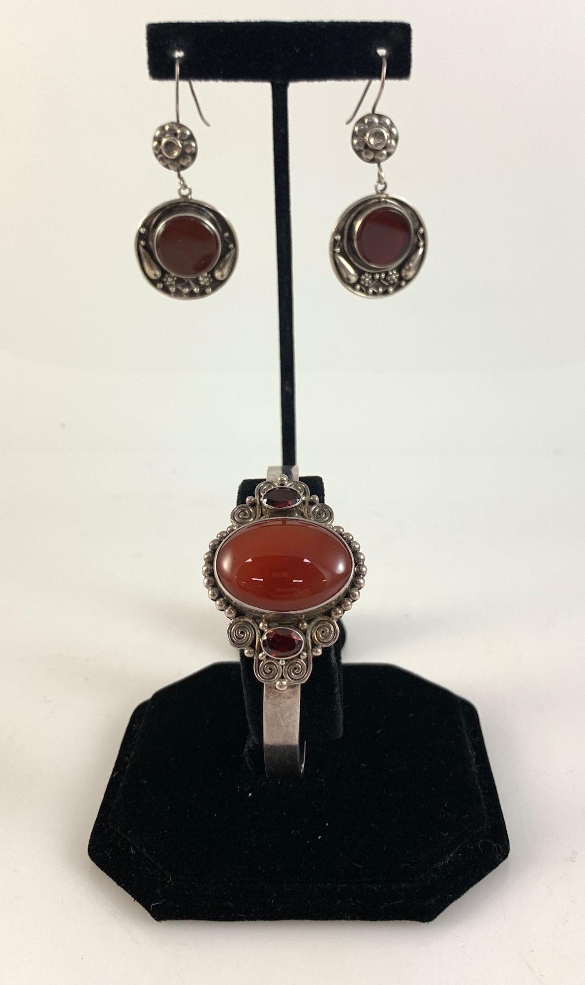 CARNELIAN & STERLING FASHION JEWELRY: CARNELIAN & STERLING FASHION JEWELRY ~ LOT INCLUDES 2.5" POLISHED CUFF W/ RED CARNELIAN CENTER STONE W/ GARNET ACCENTS FEATURING BEADED EDGEWORK AND WIRE SPIRAL ACCENTS & ONE PR. FRENCH WIRE DANGLE EA