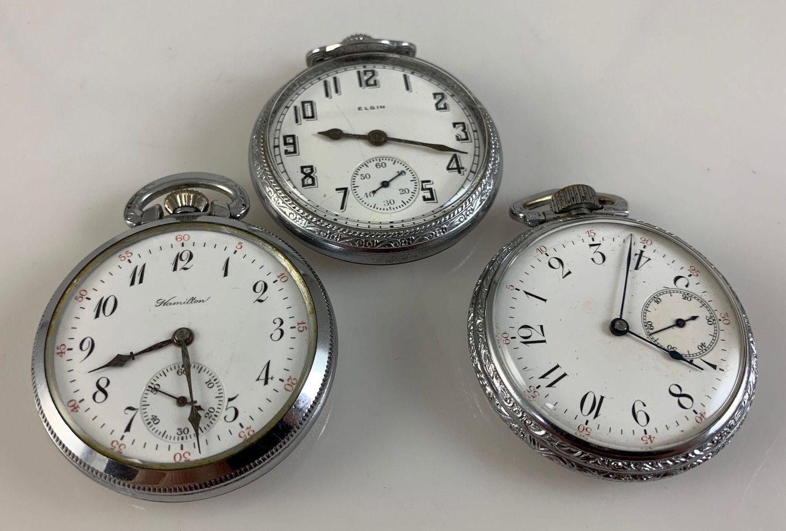 THREE POCKET WATCHES (1 of 13)