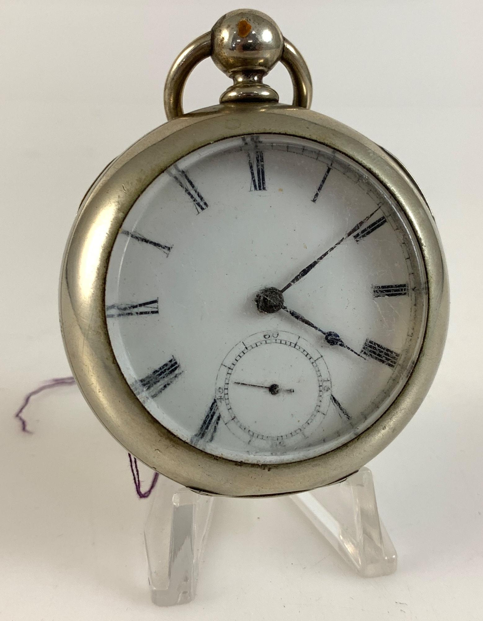 ANTIQUE WALTHAM POCKET WATCH: ANTIQUE WALTHAM POCKET WATCH ~ WHITE FACE W/ROMAN NUMERAL INDICATORS. 2" DUEBER "SILVERINE" CASE W/HIGH POLISH FINISH. KEY WIND. WINDS AND TICKS. WITH KEY. MOVEMENT NUMBERED 1182194. BROADWAY GRADE CI