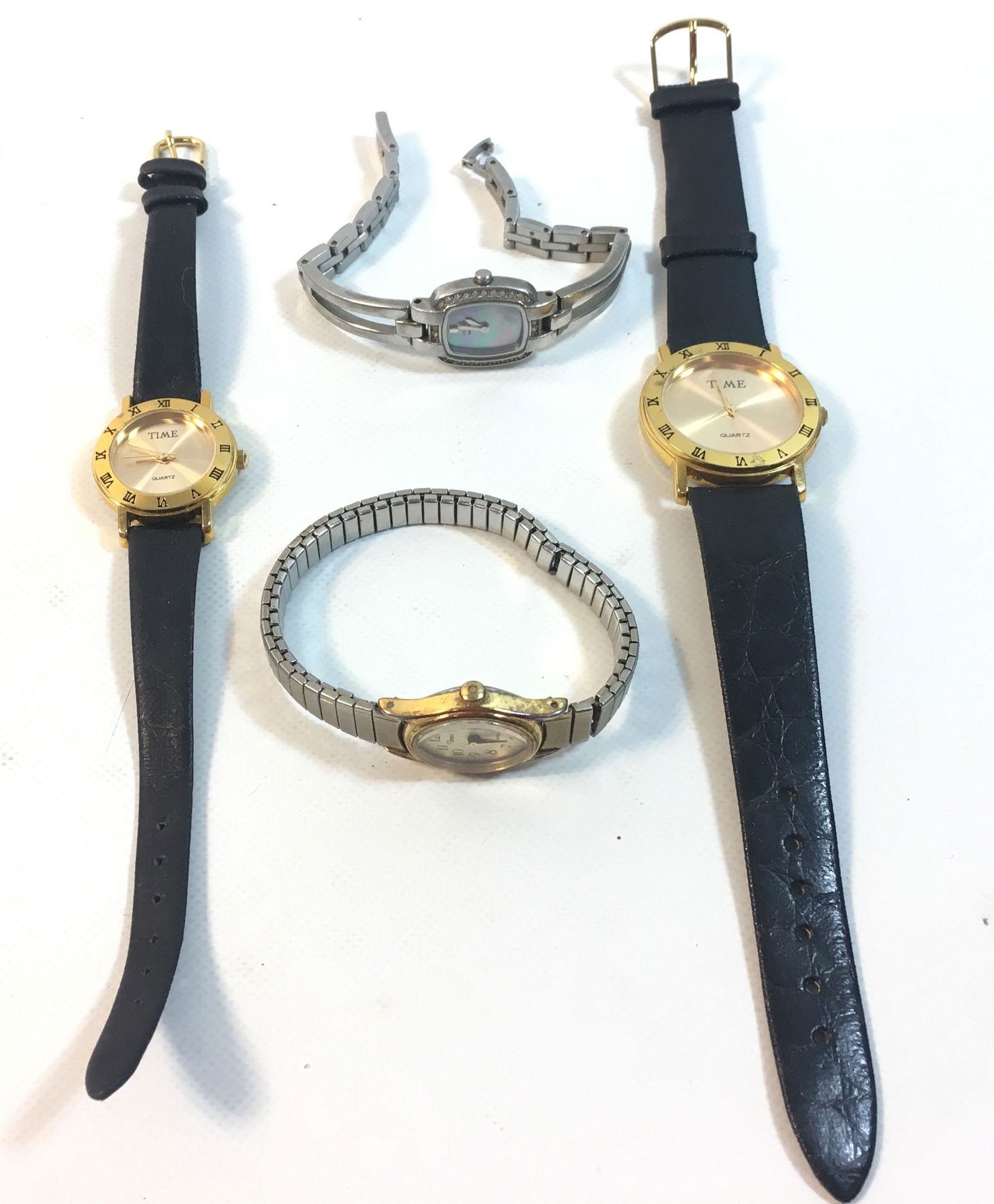 FOUR WRIST WATCHES (1 of 4)