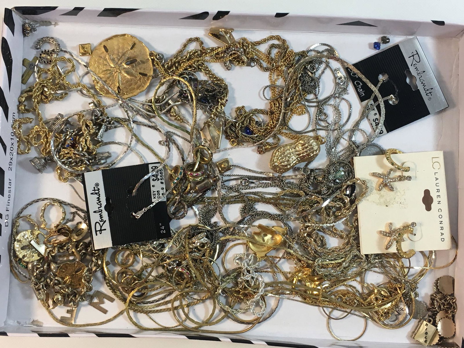 BOX LOT GOLD AND SILVER TONE FASHION JEWELRY: BOX LOT GOLD AND SILVER TONE FASHION JEWELRY ~ LOT INCLUDES NEW OLD STOCK PIECES FROM LAUREN CONRAD & REMBRANT, GOLD AND SILVER TONE CHAINS, SEVERAL CHARM BRACELETS W/ PHONETIC TRAVEL AND TEN COMMANDM