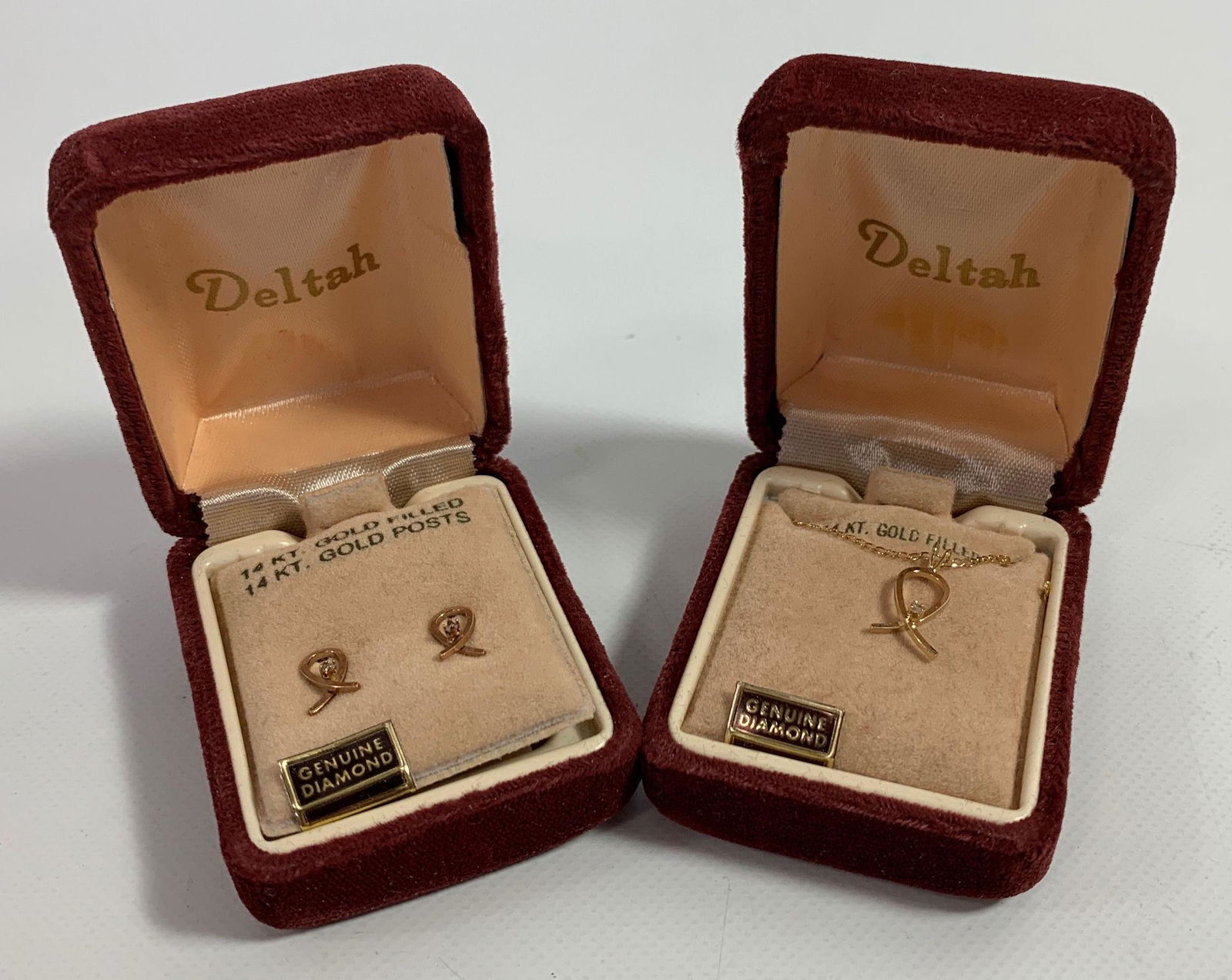 JEWELRY SET: JEWELRY SET ~ MATCHED GOLD-FILLED JEWELRY SET W/SMALL DIAMOND ACCENTS. NEW OLD STOCK IN JEWELRY BOXES. MADE BY DELTAH. POST EARRINGS (14KT POSTS). POLISHED CHAIN W/SMALL LOOP PENDANT.