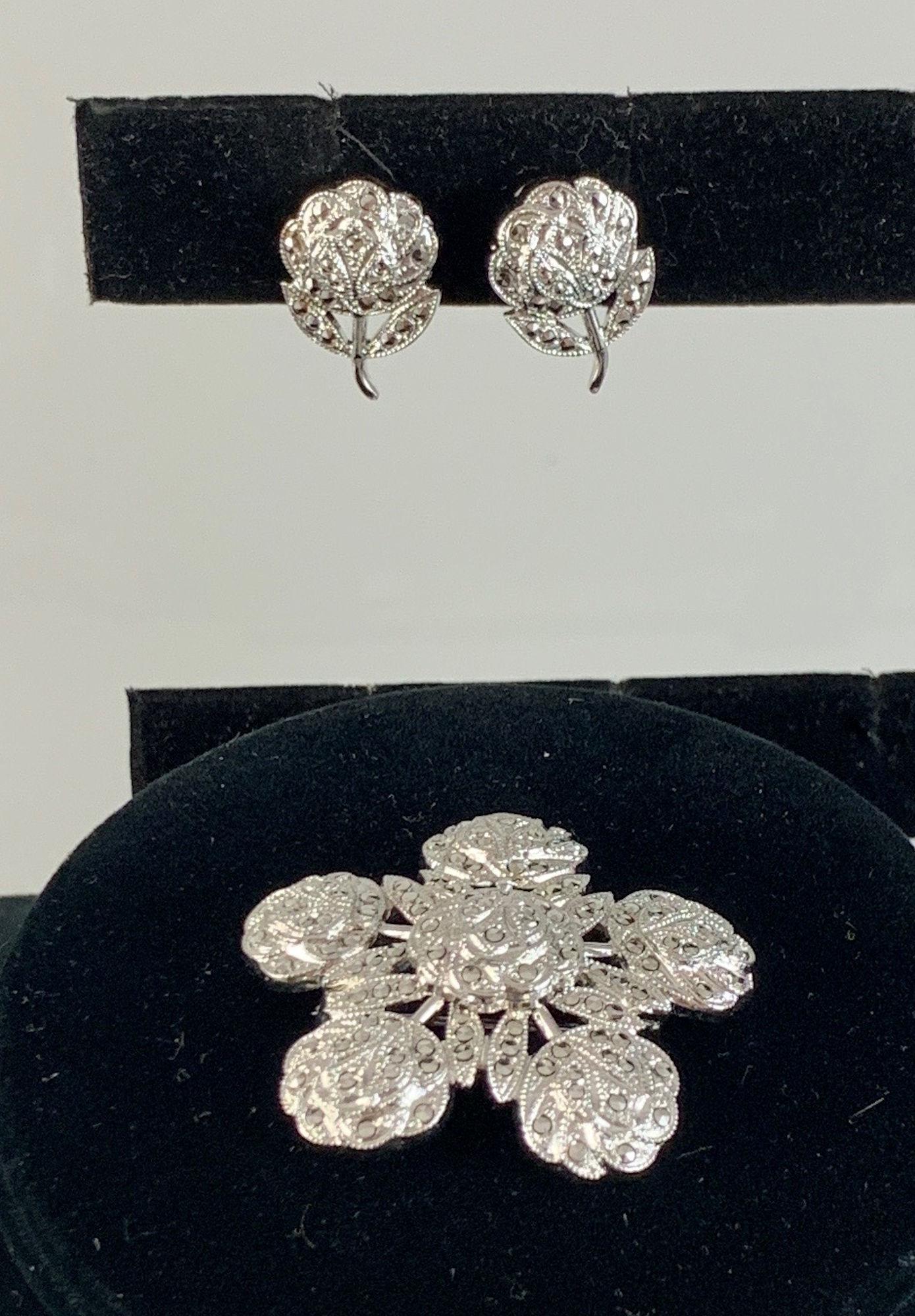 MARCASITE JEWELRY SET: MARCASITE JEWELRY SET ~ SILVER TONE SCREWBACK EARRINGS W/ ROSE MOTIF W/ MATCHING FLORAL PIN FEATURING ROSES CONNECTED INTO LARGER FLORAL DESIGN