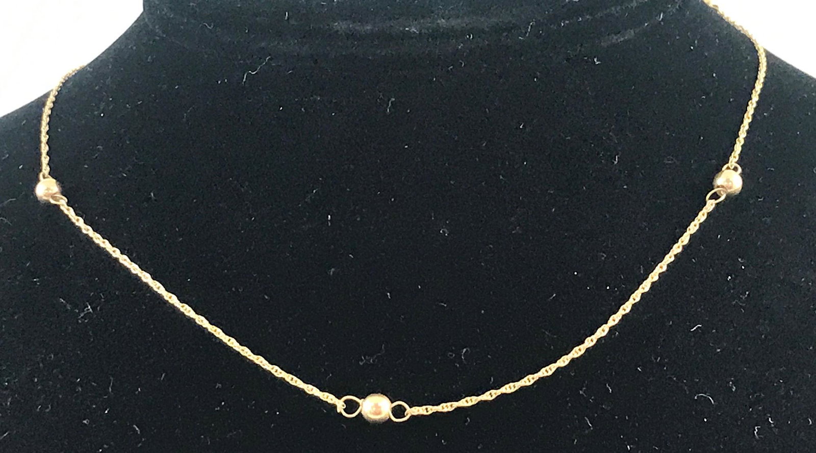 14KT YELLOW GOLD NECKLACE: 14KT YELLOW GOLD NECKLACE ~ 15" CHOKER LENGTH NECKLACE W/ HIGH POLISH GOLD BEADS (1.3 GRAMS TW)