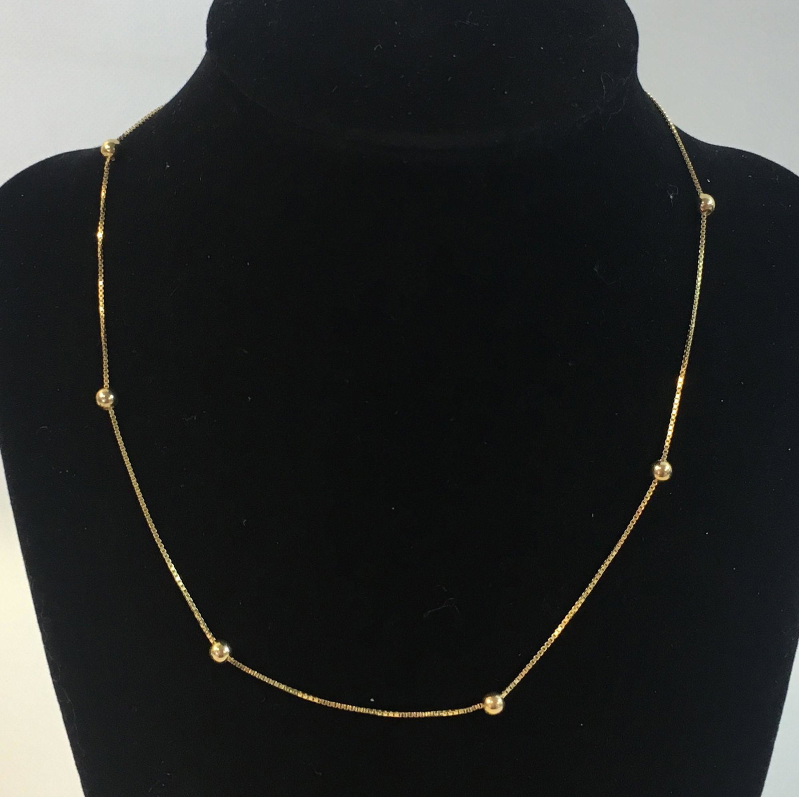 GOLD NECKLACE: GOLD NECKLACE ~ 16" CHOKER LENGTH 14KT GOLD NECKLACE (YELLOW). ITALIAN MADE. BOX CHAIN STYLE W/POLISHED BEAD ADORNMENTS. 2.9 GRAMS TW.
