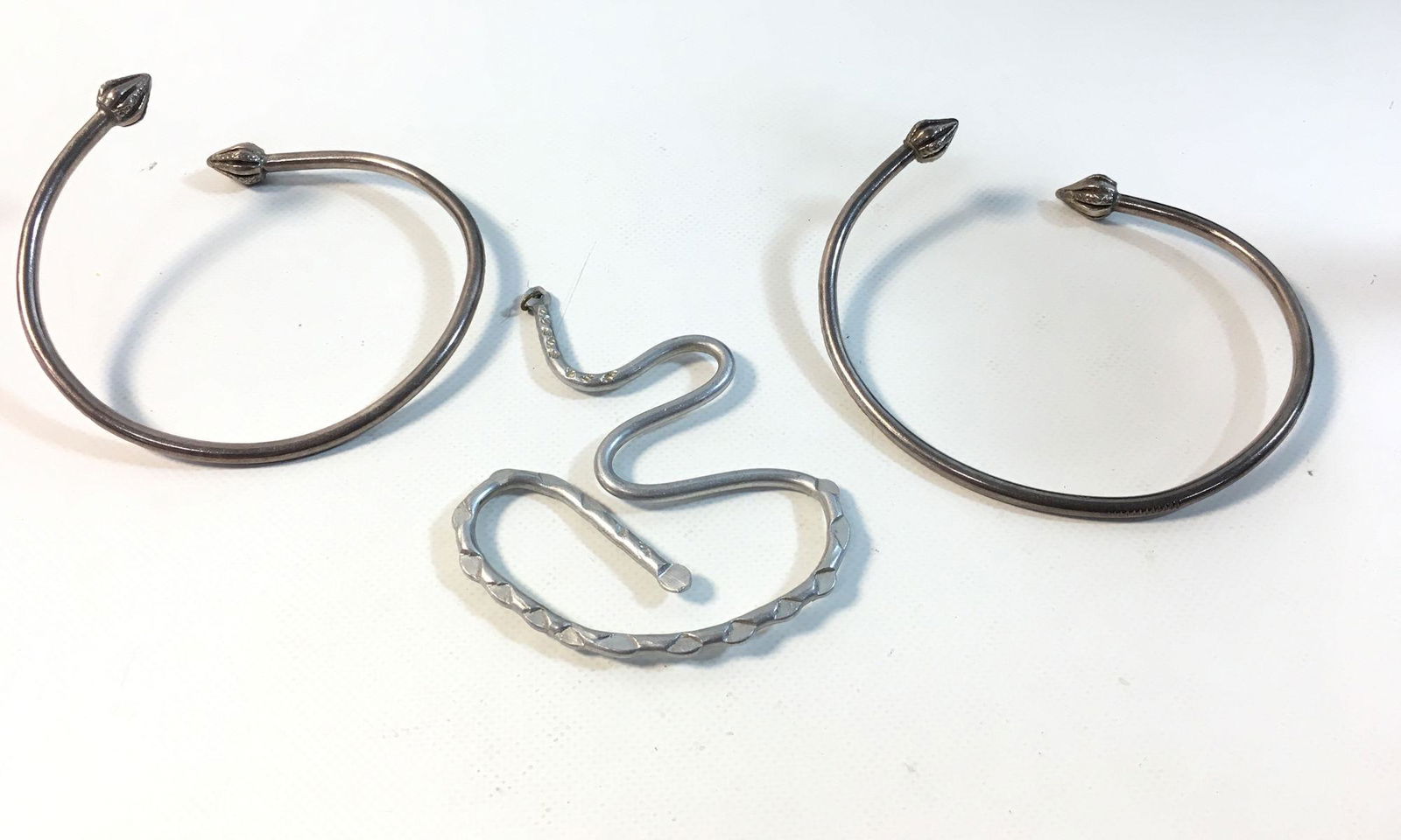 TWO SILVER TONE BANGLES + ONE PENDANT (1 of 4)