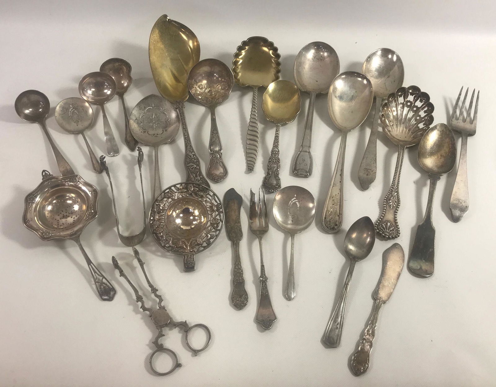 TWENTY-THREE PIECES STERLING SILVER AND SILVER PLATE: TWENTY-THREE PIECES STERLING SILVER AND SILVER PLATE FLATWARE ~ FIVE PIECES SILVER PLATE SERVEWARE AND FLATWARE. EIGHTEEN PIECES VINTAGE STERLING SILVER FLATWARE AND SERVEWARE. STYLES FROM TIFFANY & C