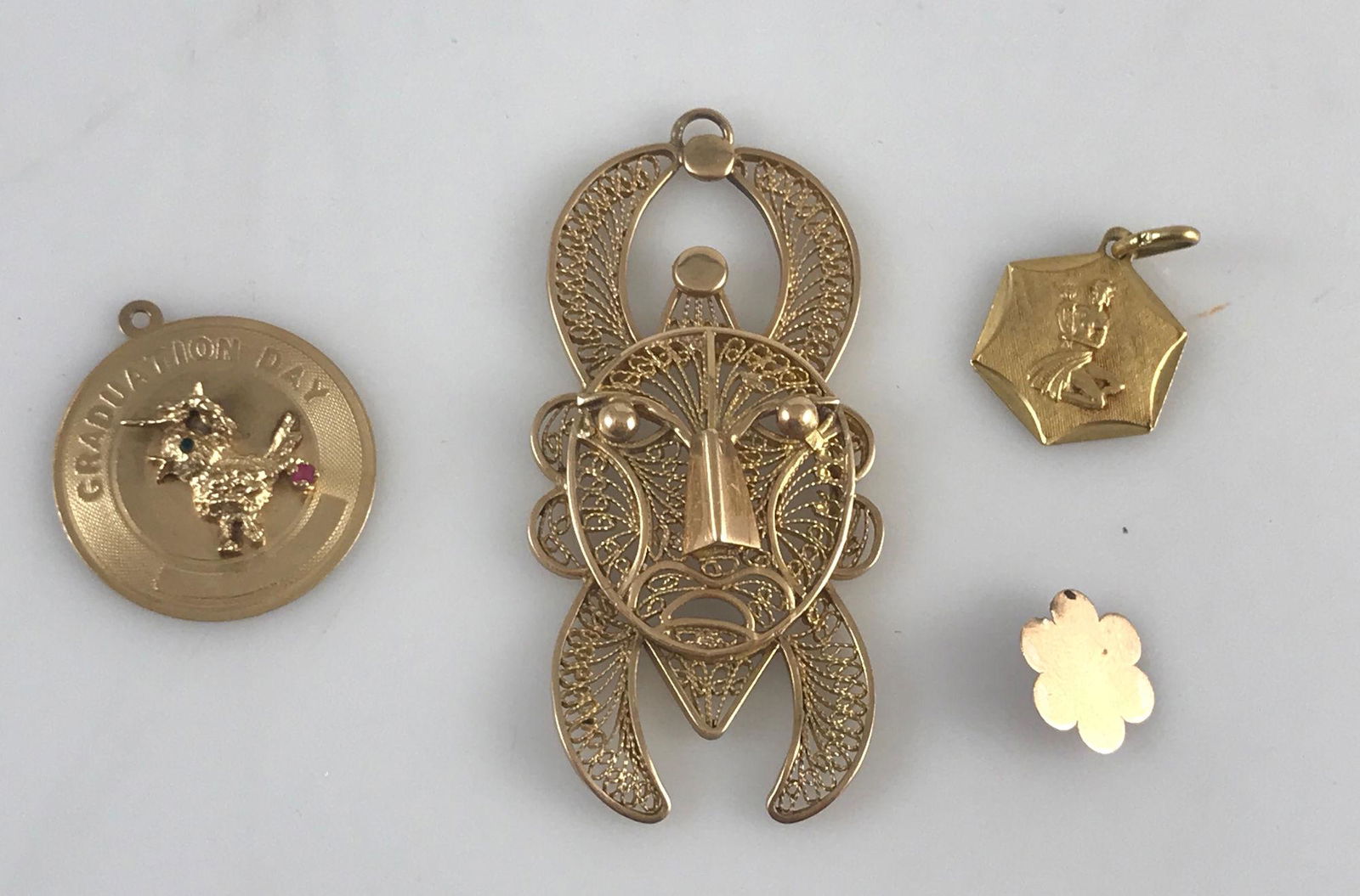 FOUR GOLD PENDANTS (1 of 6)