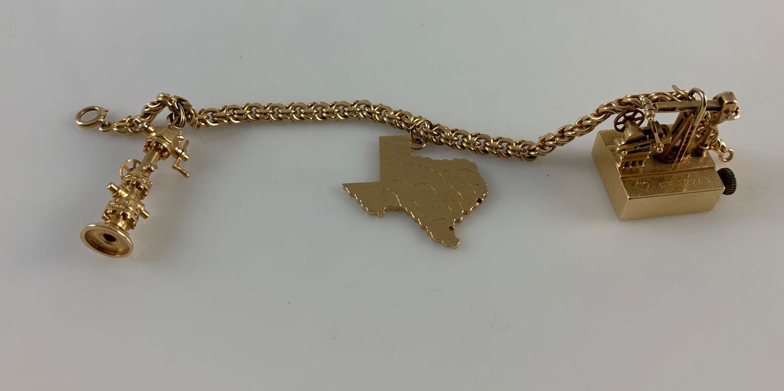 14KT GOLD CHARM BRACELET (1 of 4)