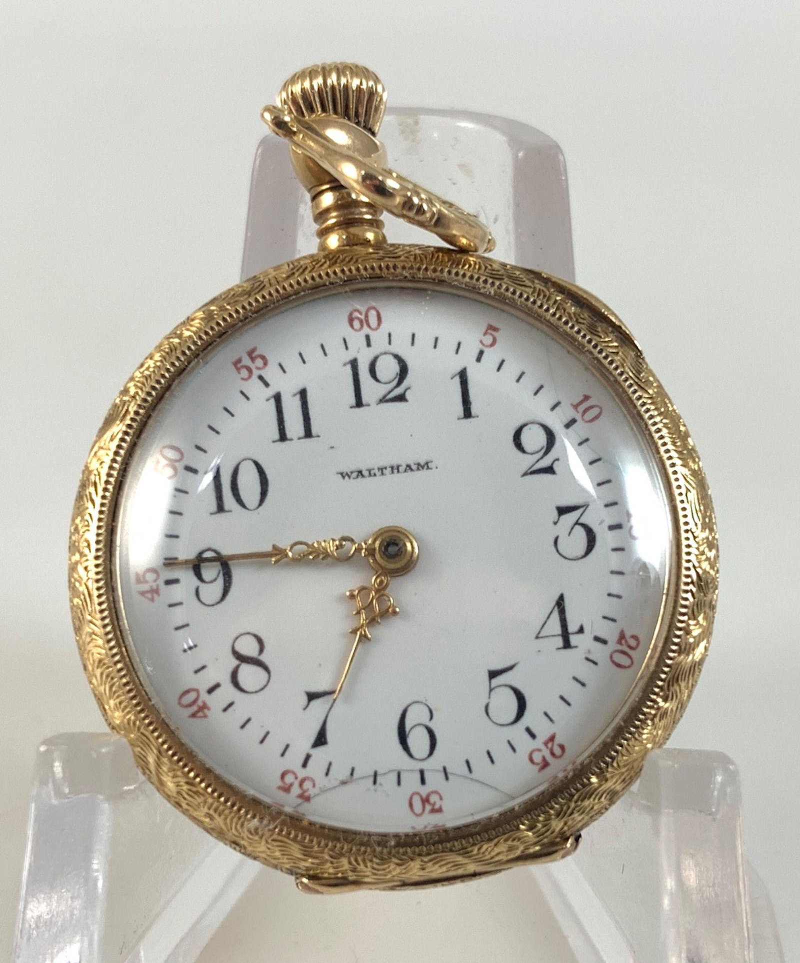 14KT GOLD POCKET WATCH FROM WALTHAM: 14KT GOLD POCKET WATCH FROM WALTHAM ~ HINGED 1.125" CASE W/ RIVER SIDE MOVEMENT NUMBERED "1206226" WINDS & SETS, WHITE FACE W/ GOLD TONE FILIGREE HANDS