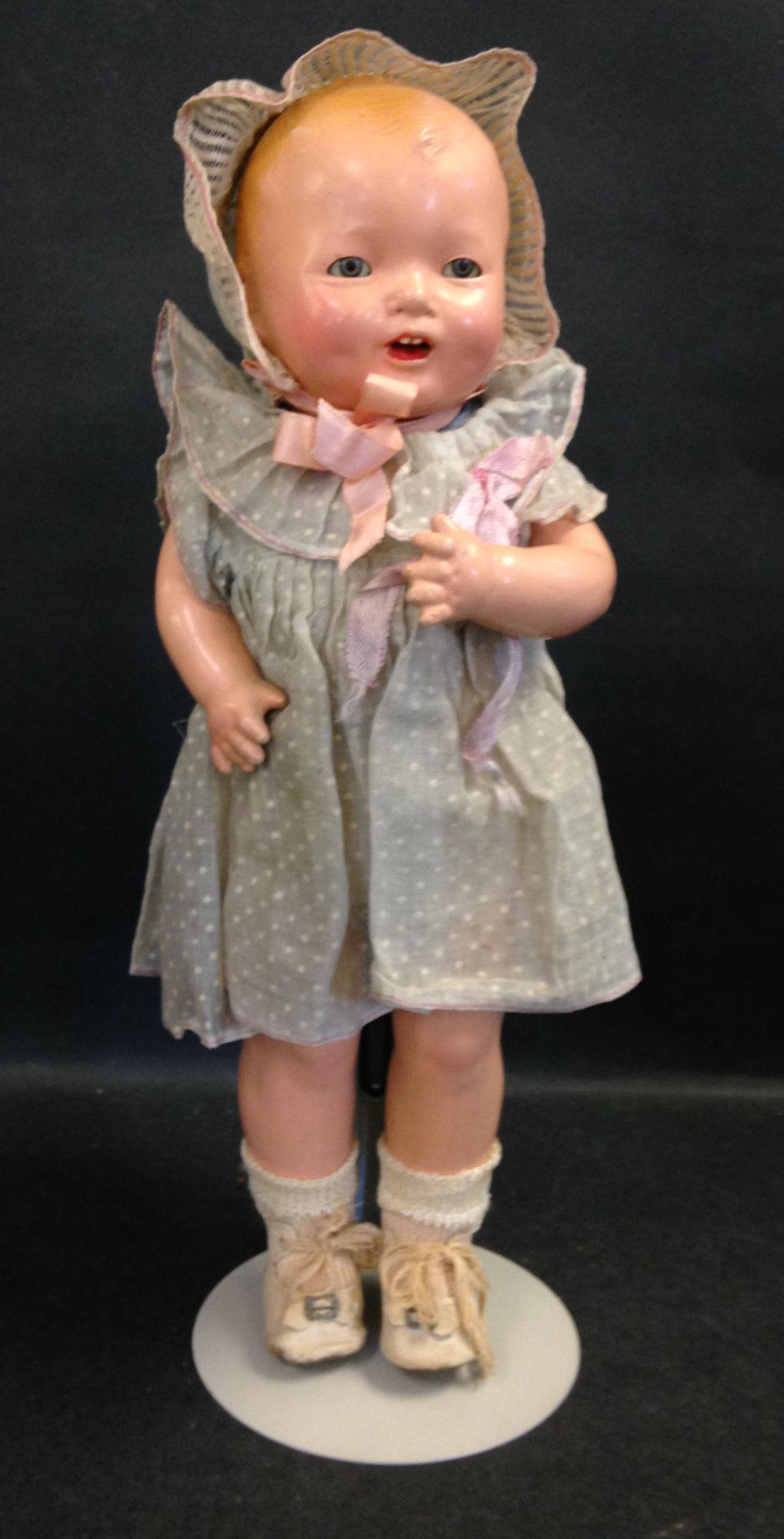 14" EFFANBEE "BUBBLES". COMPOSITION SHOULDER HEAD,: 14" EFFANBEE "BUBBLES". COMPOSITION SHOULDER HEAD, MOLDED AND PAINTED HAIR, TIN SLEEP EYES, OPEN MOUTH WITH MOLDED TEETH, ON CLOTH TORSO WITH COMPOSITION ARMS AND LEGS. CLOTHES APPEAR TO BE ORIGINAL.