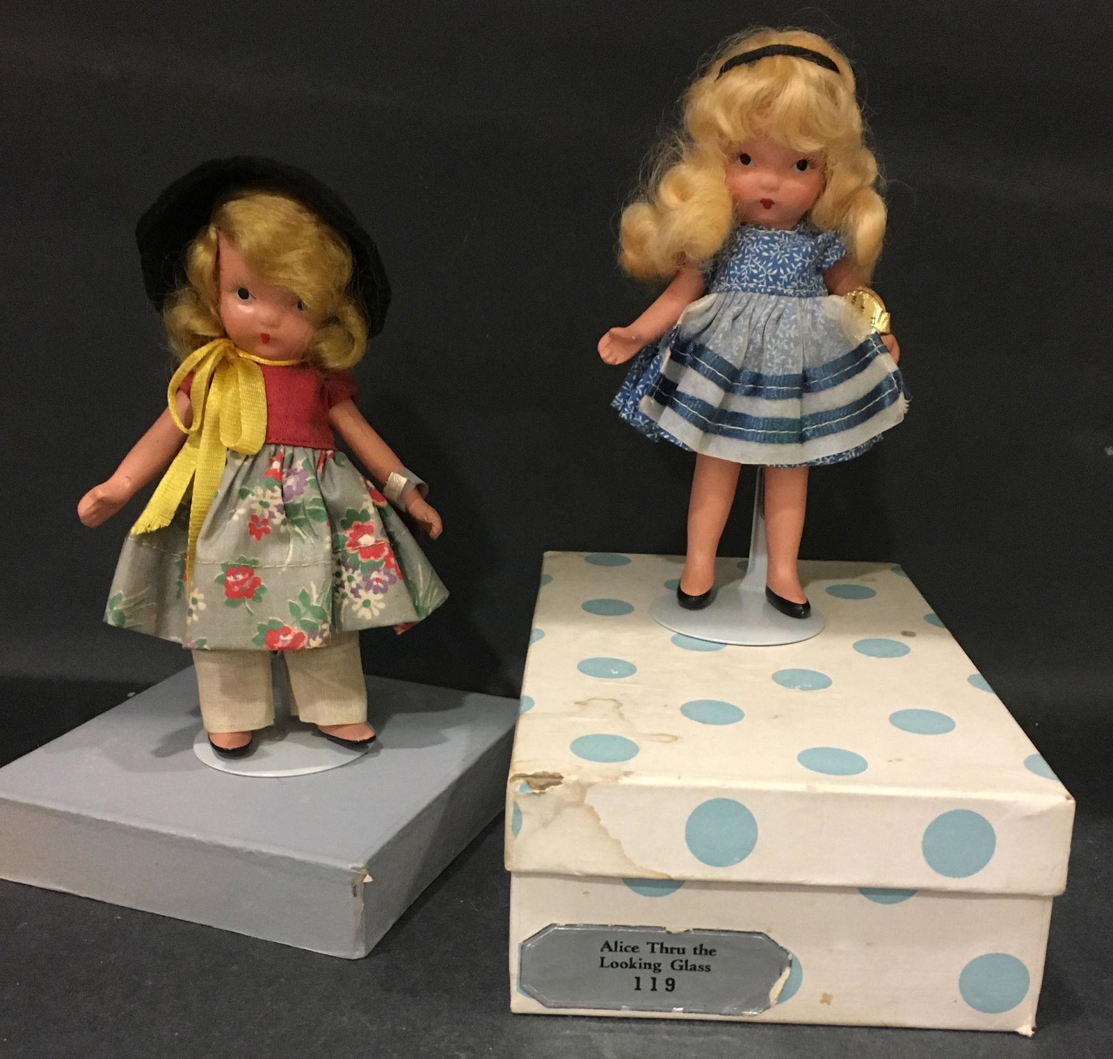 (2) 5½" STORYBOOK DOLLS MOTHER GOOSE/FAIRY TALE: (2) 5½" STORYBOOK DOLLS MOTHER GOOSE/FAIRY TALE SERIES "OVER THE HILLS" #114 AND "ALICE IN WONDERLAND" #125 IN ORIGINAL COSTUMES. "STORY BOOK DOLL USA" MARK ON JOINTED SLIM BISQUE BODIES. BOTH 