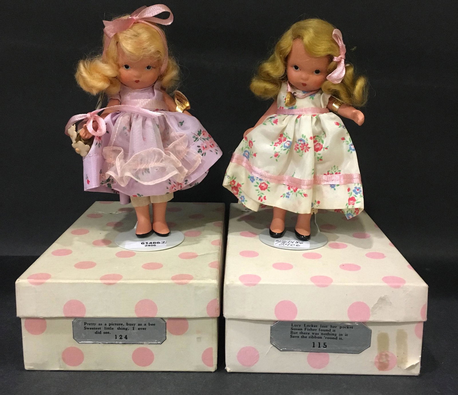 (2) 5½" STORYBOOK DOLLS MOTHER GOOSE/FAIRY TALE: (2) 5½" STORYBOOK DOLLS MOTHER GOOSE/FAIRY TALE SERIES IN ORIGINAL COSTUMES. "PRETTY AS A PICTURE" #124 AND "LUCY LOCKET" #115. "STORY BOOK DOLL USA" MARK ON JOINTED PT BISQUE BODIES. BOTH WEAR