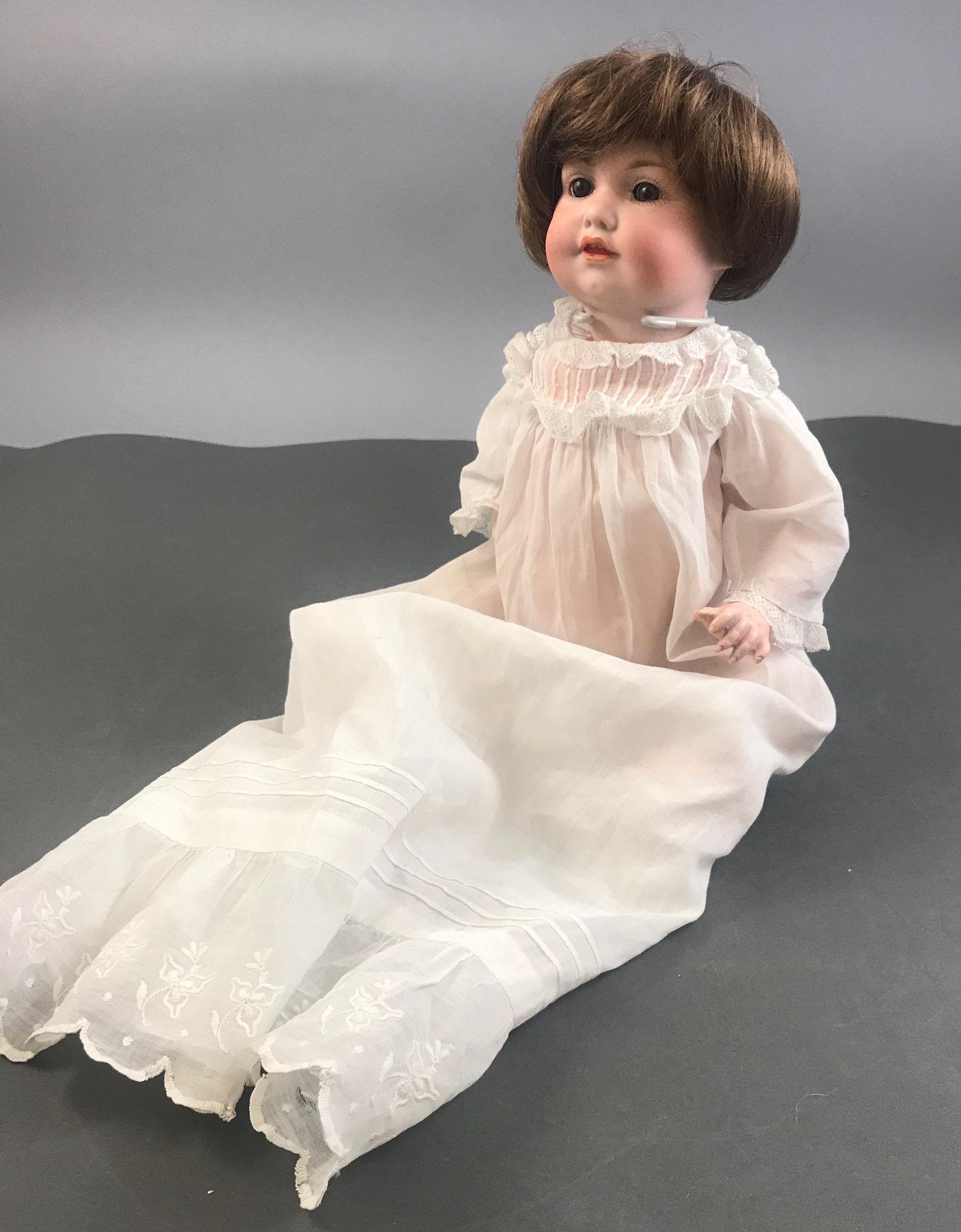 15" ARMAND MARSEILLE 971 BISQUE SOCKET HEAD CHARACTER: 15" ARMAND MARSEILLE 971 BISQUE SOCKET HEAD CHARACTER BABY. REPLACED WIG, GLASS SLEEP EYES, OPEN/CLOSED MOUTH WITH TEETH, ON FIVE PIECE COMPOSITION BENT LIMB BABY BODY.