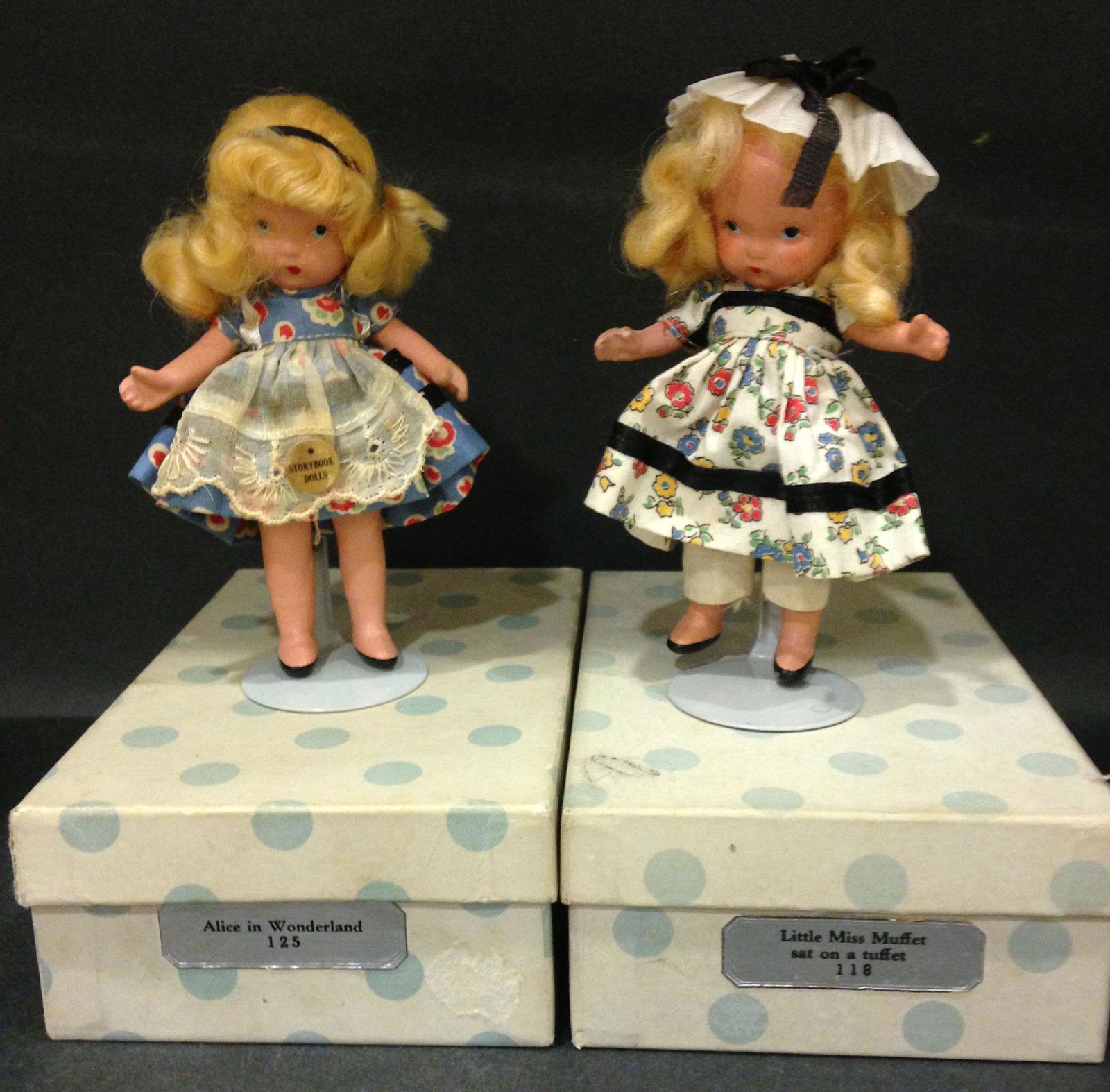 (2) 5½" STORYBOOK DOLLS MOTHER GOOSE/FAIRY TALE: (2) 5½" STORYBOOK DOLLS MOTHER GOOSE/FAIRY TALE SERIES "ALICE IN WONDERLAND" #125 AND "LITTLE MISS MUFFET SAT ON A TUFFET" #118 IN ORIGINAL COSTUMES. "STORY BOOK DOLL USA" MARK ON JOINTED PT BI