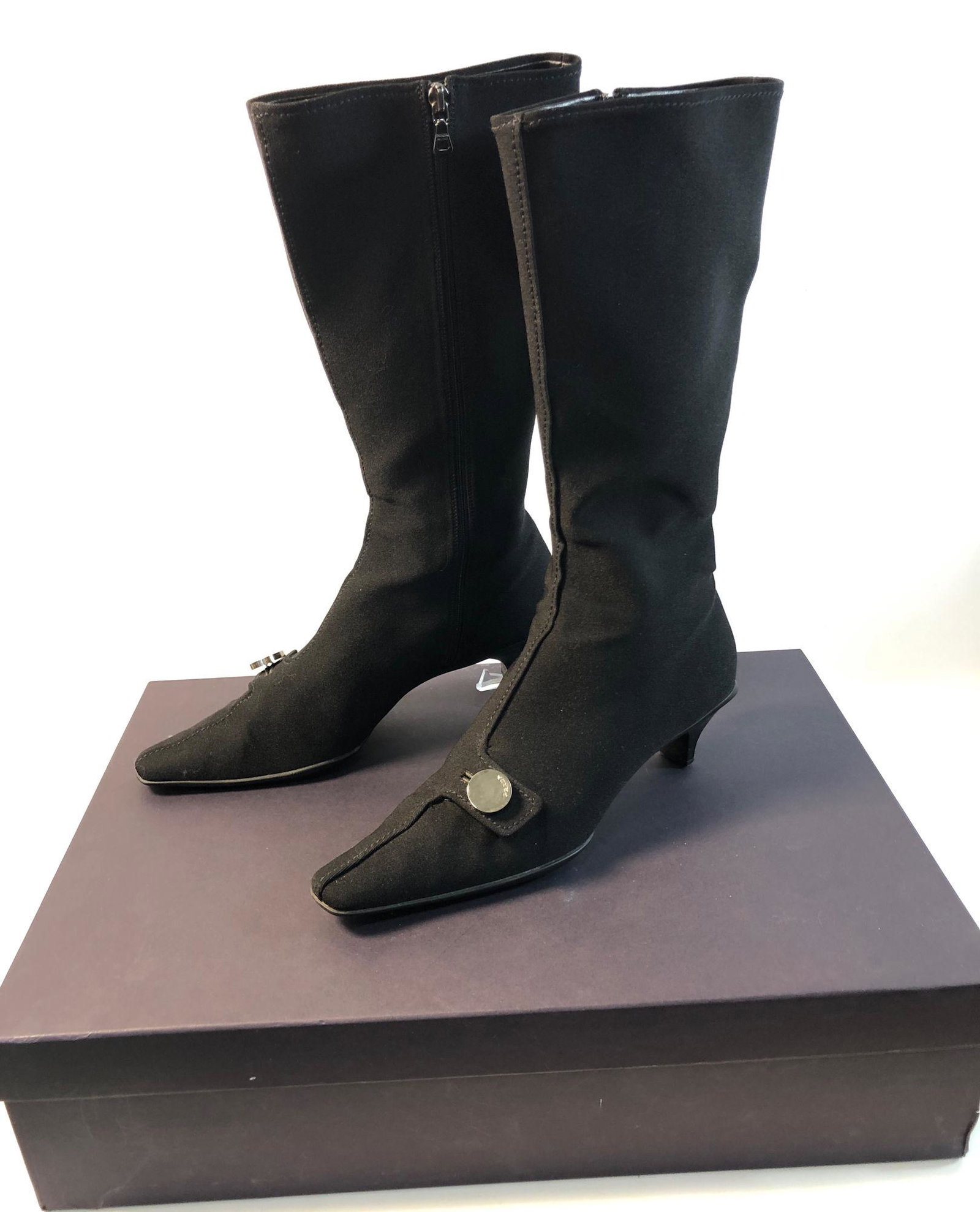PRADA BOOTS: PRADA BOOTS ~ SIZE 39 EU, POINTED SQUARE TOE, SILVER TONE HARDWARE, ZIPPED CLOSURE, MID CALF STYLE, BLACK NYLON EXTERIOR WITH LEATHER INTERIOR, GENTLY WORN WITH MINOR SCUFFS TO HEEL, IN ORIGINAL BOX,