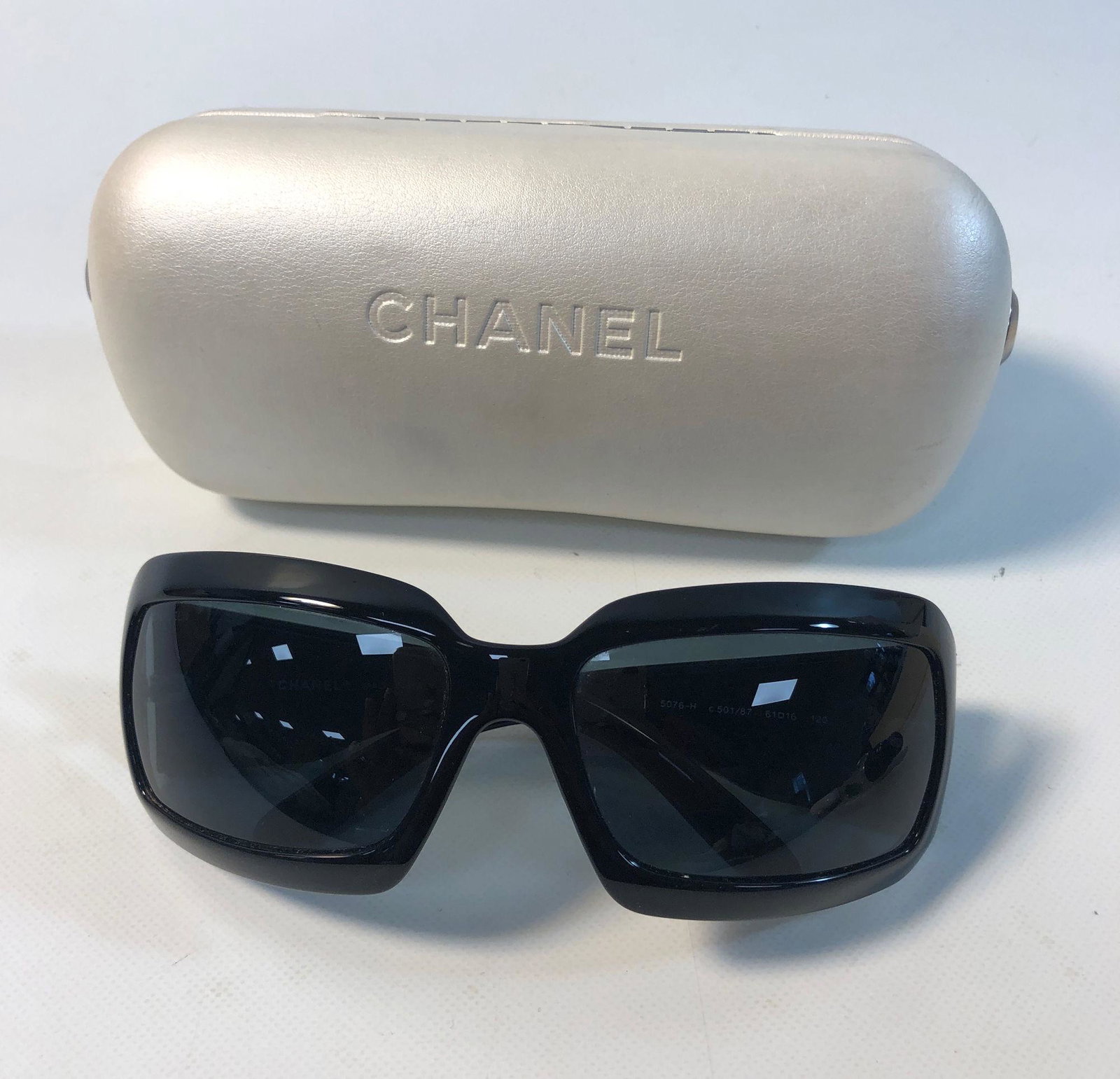 CHANEL SUNGLASSES: CHANEL SUNGLASSES ~ LIKE NEW CONDITION, ROUNDED SQUARE STYLE WITH MOTHER OF PEARL DOUBLE "C" ACCENTS ON ARMS, ITALIAN MADE, LITTLE TO NO SCRATCHES OR BLEMISHES, IN BRANDED CASE, NO. 5076-H