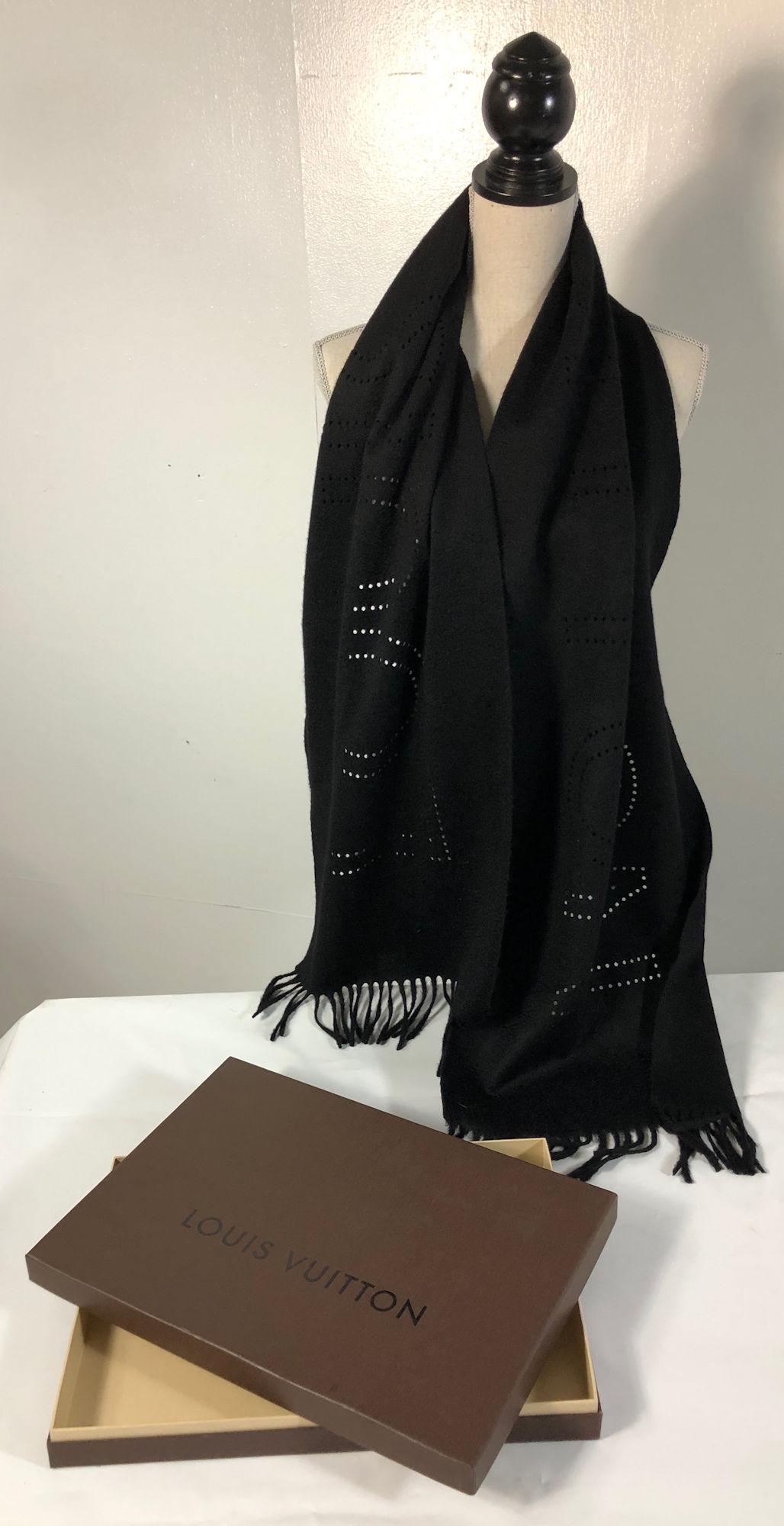 LOUIS VUITTON CASHMERE SCARF: LOUIS VUITTON CASHMERE SCARF ~ BLACK CASHMERE SCARF, LIKE NEW CONDITION, ITALIAN MADE, DIE CUT/PUNCHED LOGO, TASSLED ENDS, APPROX. 72" X 15" ORIGINAL BOX INCLUDED
