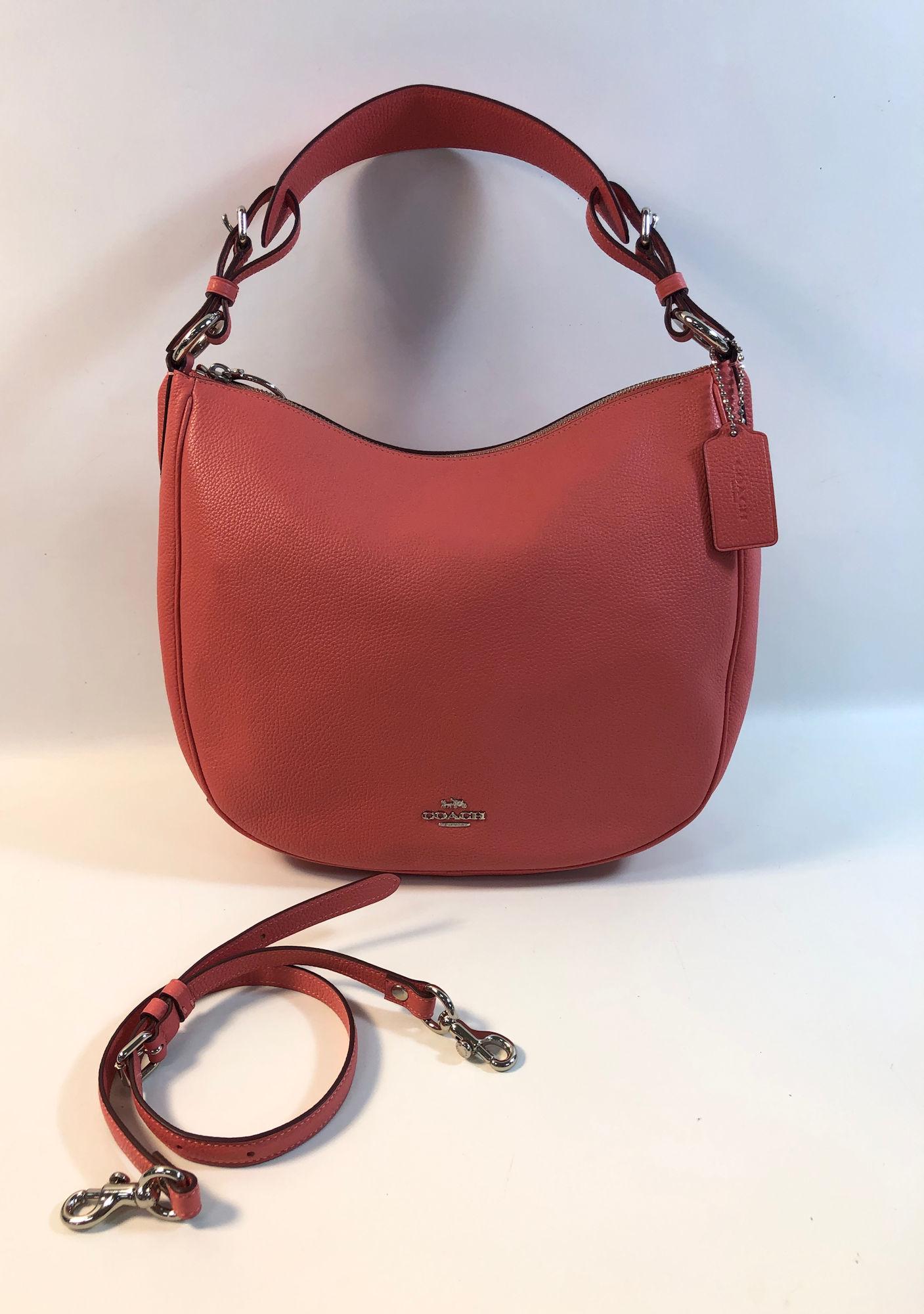 COACH HANDBAG: COACH HANDBAG ~ U SHAPED SHOULDER BAG, PINK PEBBLED LEATHER, TWO ADJUSTABLE LENGTH STRAPS, LIKE NEW CONDITION, PINK INTERIOR AND EXTERIOR, NO. L1848-3559, APPROX. 12.5" W X 10"L, SILVER TONE HARDWARE,