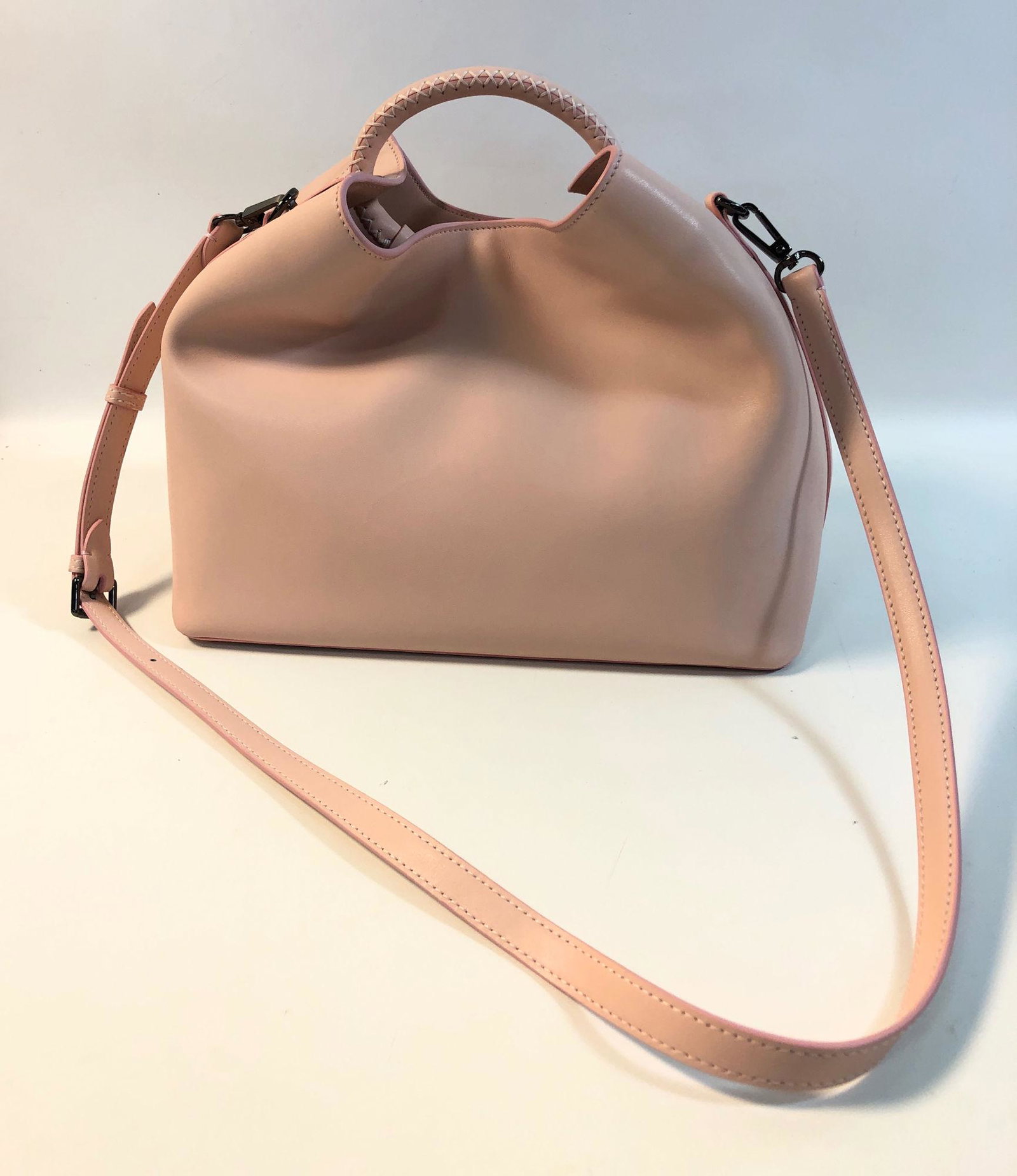 ELLEME RAISIN TOTE BAG: ELLEME RAISIN TOTE BAG ~ ITALIAN MADE BLUSH PINK LEATHER BAG, THREADED TOP HANDLE W/ CLIP/MAGNETIC CLOSURE, LIKE NEW CONDITION, GUN METAL HARDWARE W/ POLISHED FINISH, APPROX. 10.75" L X 5.75" W X 8" D
