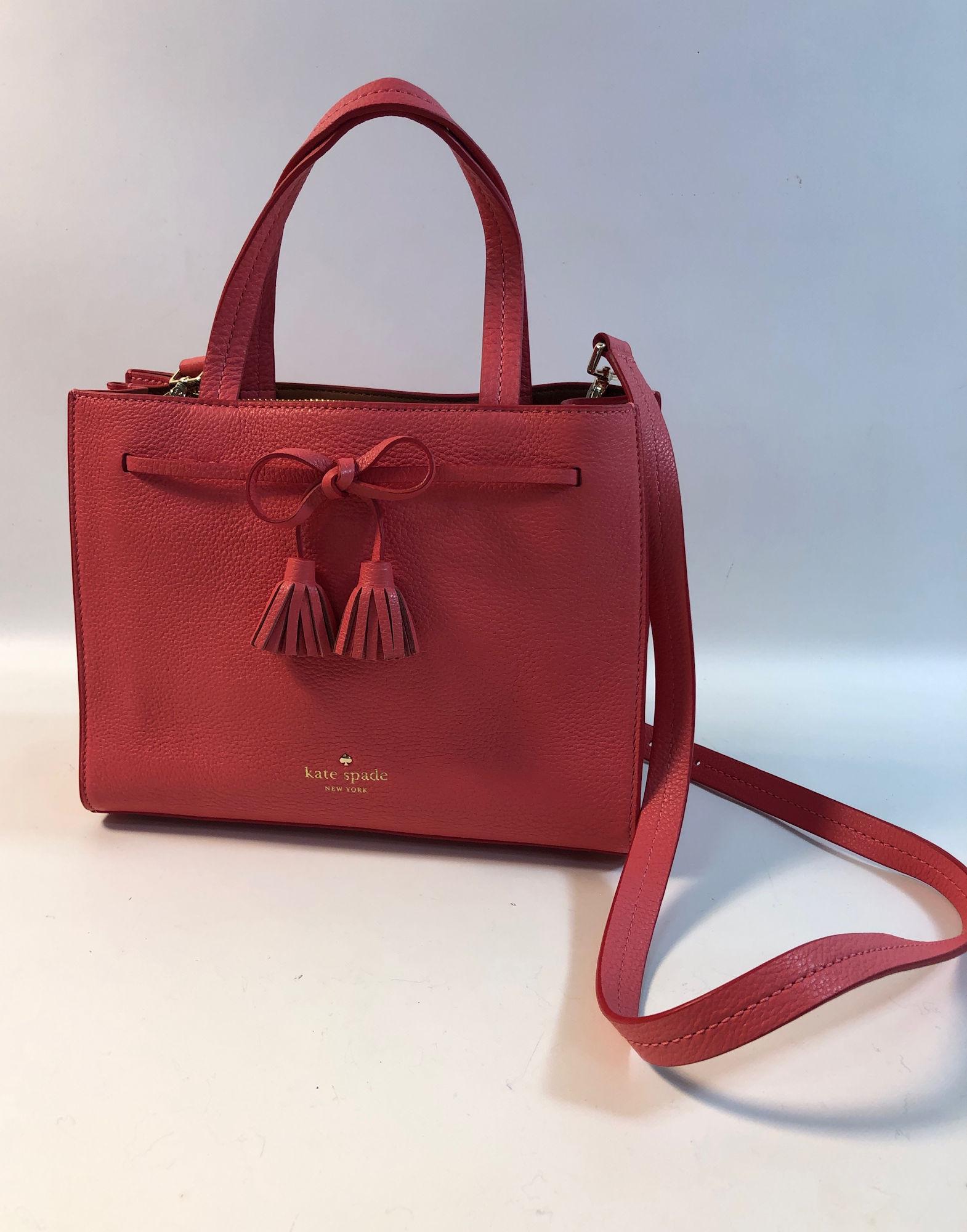 KATE SPADE HANDBAG: KATE SPADE HANDBAG ~ LIKE NEW CONDITION, "HAYES STREET SAM" STYLE IN WARM GUAVA PINK, BROWN LEATHER INTERIOR, GOLD TONE HARDWARE, DETACHABLE SATCHEL STRAP, PRESSED FOIL LOGO, APPROX 10"L X 4.25" W 9.5