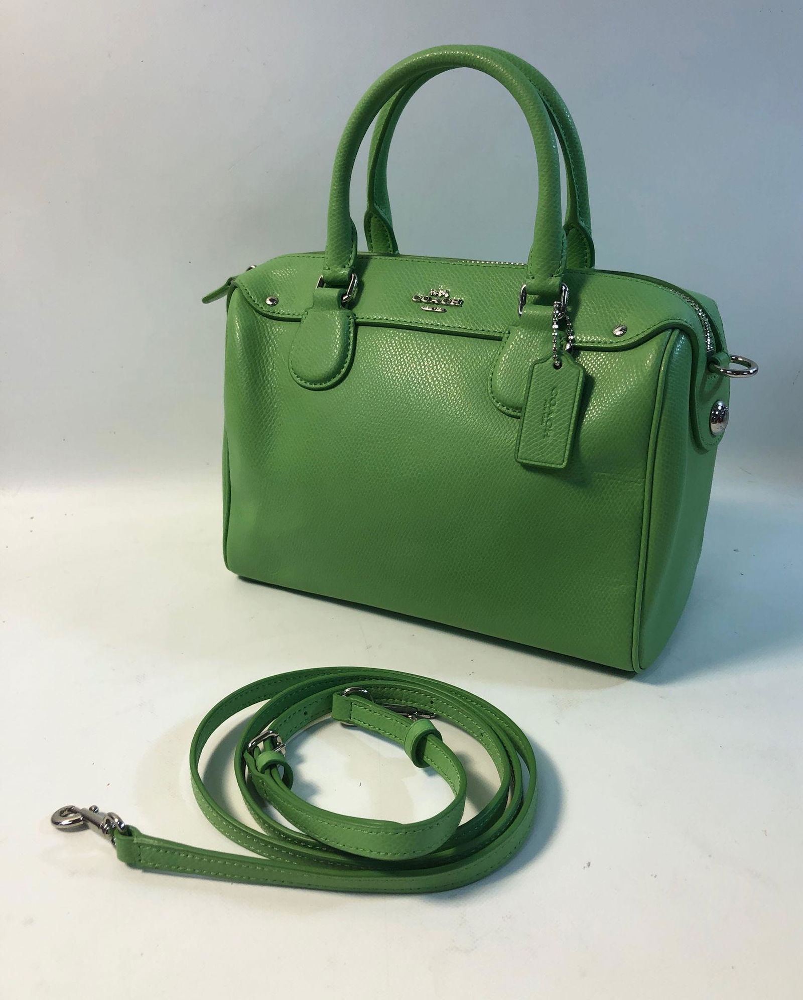 COACH CROSSBODY: COACH CROSSBODY ~ BENNETT MINI CROSSBODY BAG, HANDCRAFTED GREEN LEATHER BAG W/ OPTIONAL CROSSBODY STRAP, SILVER TONE HARDWARE, ONE MAIN COMPARTMENT FEATURING ONE ZIP AND ONE OPEN POCKET, GREEN INTERIO