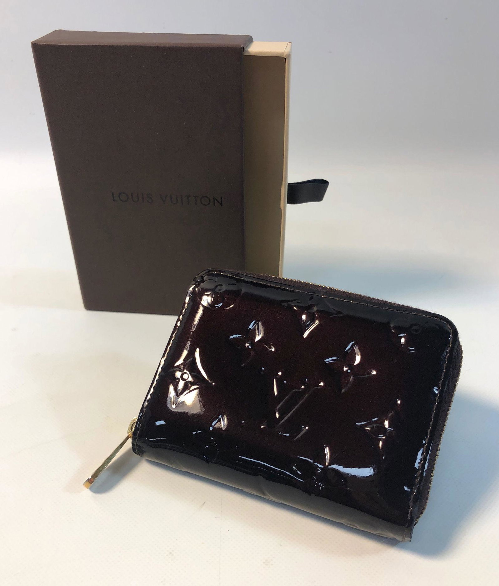 LOUIS VUITTON WALLET: LOUIS VUITTON WALLET ~ AMARANTE MONOGRAM VERNIS LEATHER, APPROX. 4.5" X 3.5", CORNER DAMAGE SOME STITCHES HAVE COME LOOSE, BOX INCLUDED, MADE IN FRANCE