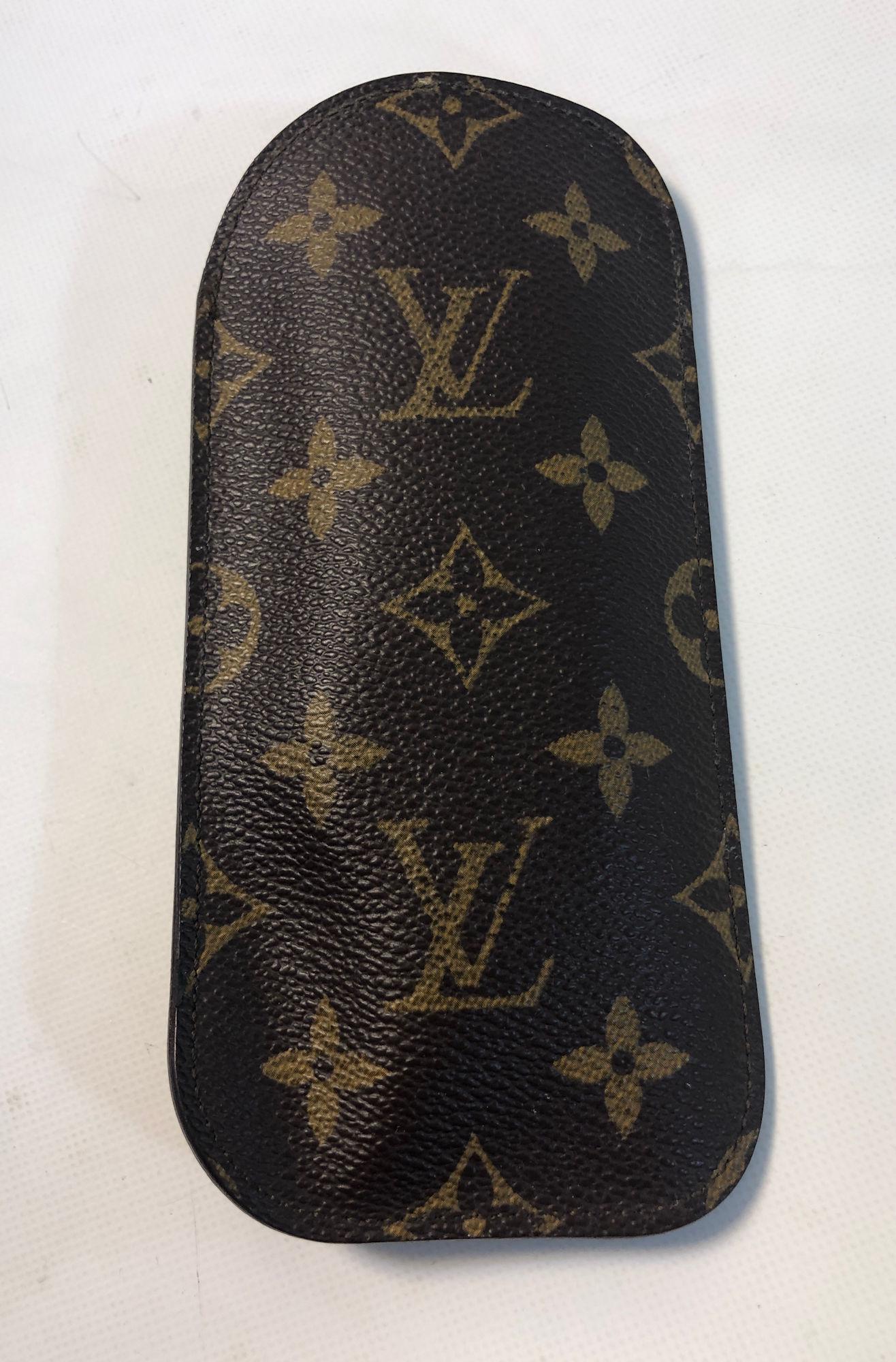 VINTAGE LOUIS VUITTON SUNGLASSES CASE: VINTAGE LOUIS VUITTON SUNGLASSES CASE ~ MONOGRAM LEATHER, SUEDE INTERIOR, EXTERIOR CONDITION VERY GOOD WITH NO CRACKING, INSIDE WELL WORN, STAMP ON SUEDE INTERIOR HAS BEEN WORN DOWN AND IS BARLEY VISI