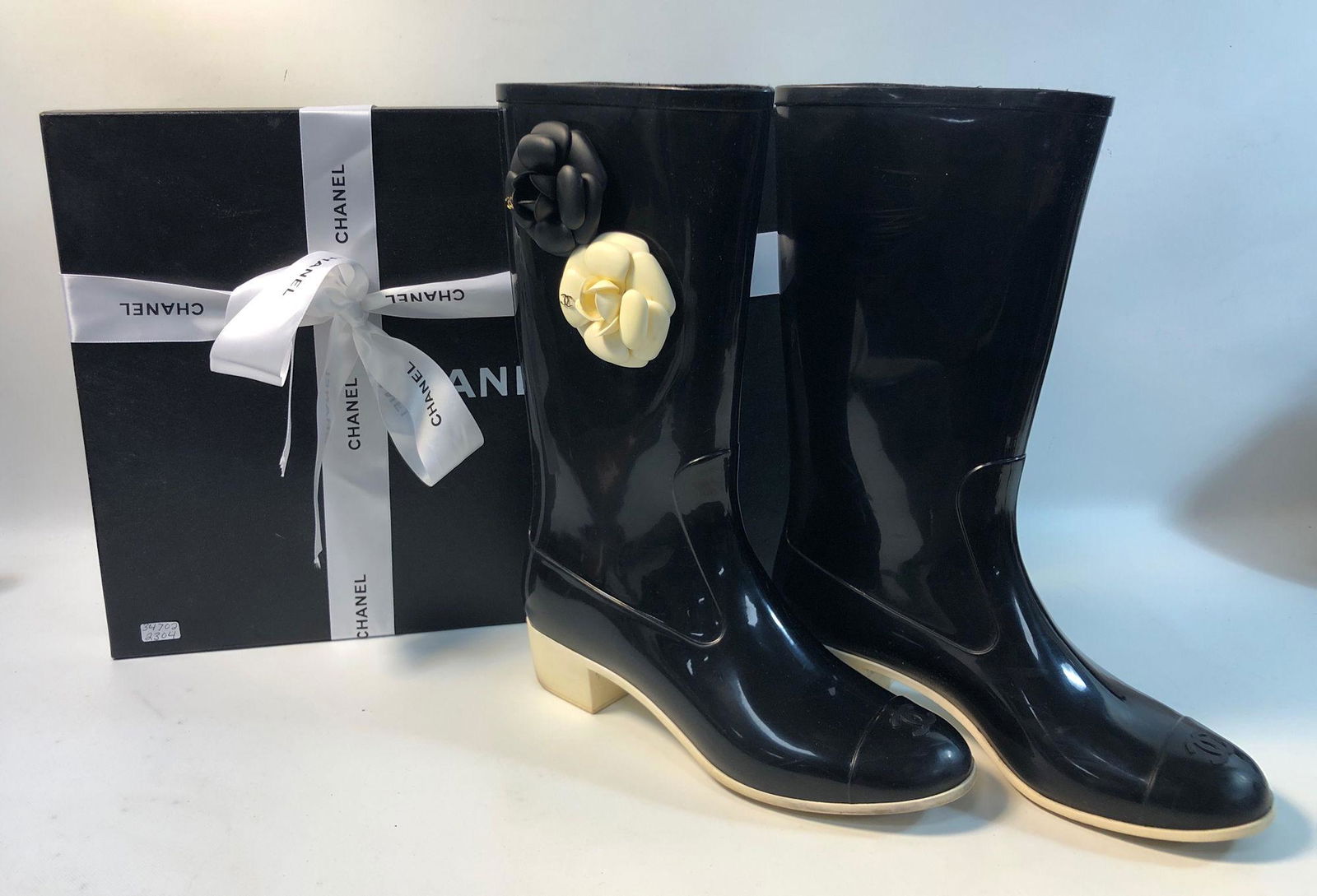 Chanel Camellia Rain Boots
