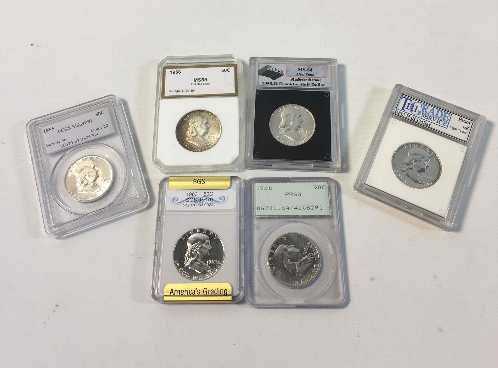 SIX GRADED HALF DOLLARS (1 of 1)