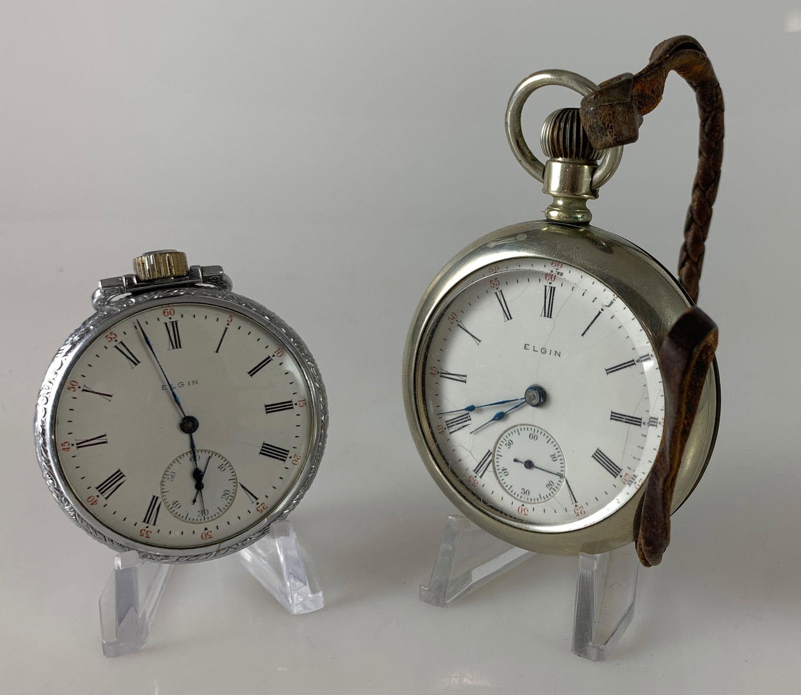 TWO ELGIN POCKET WATCHES (1 of 9)