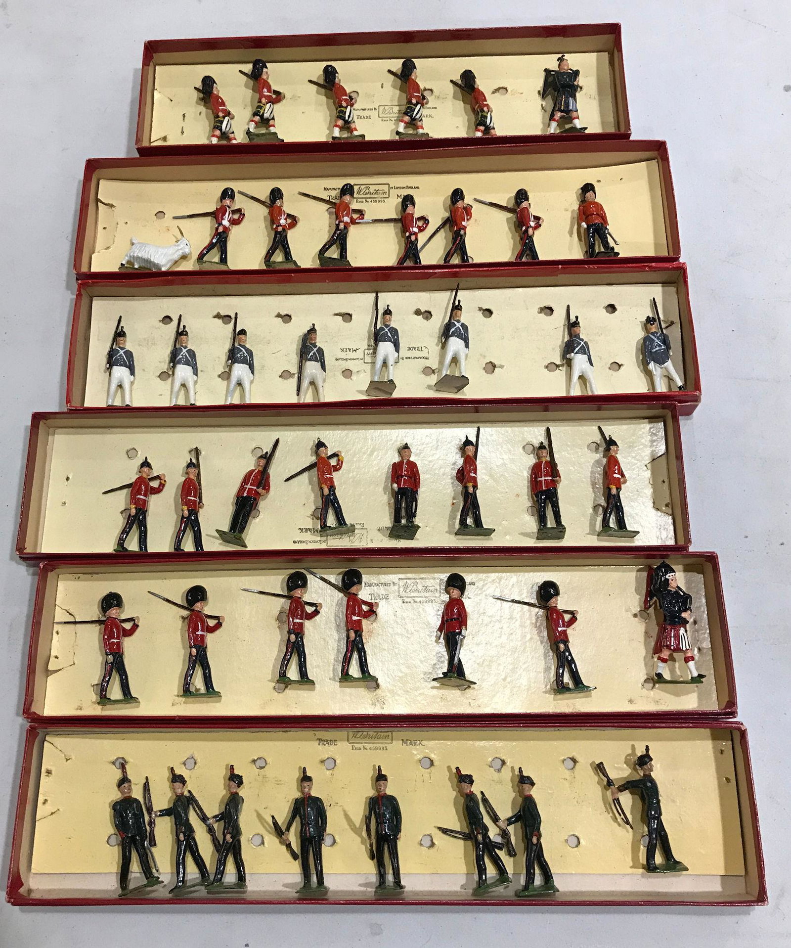 LOT 6 SETS BRITAINS SOLDIERS - 11 KING'S ROYAL RIFLE: LOT 6 SETS BRITAINS SOLDIERS - 11 KING'S ROYAL RIFLE CORPS #2072, 8 MIDDLESEX REGIMENT #76, 6 GORDON HIGHLANDERS #77, 7 SCOTS GUARD #75, 8 WEST POINT CADETS #299, 7 ROYAL WELCH FUSILIERS AND GOAT #74.