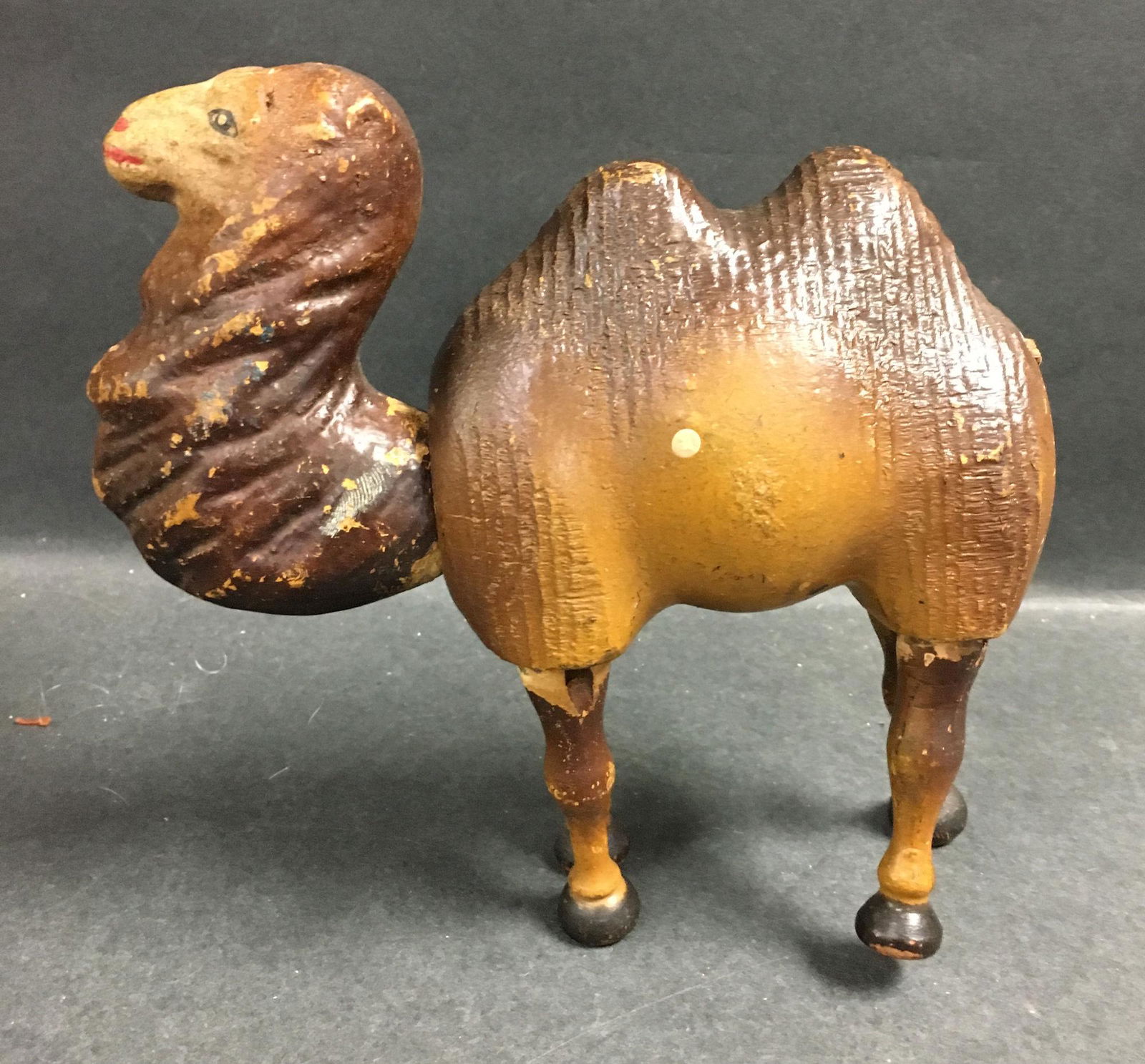 SCHOENHUT FULL SIZE CAMEL WITH TWO HUMPS. STRING: SCHOENHUT FULL SIZE CAMEL WITH TWO HUMPS. STRING JOINTED NECK AND LEGS. 7" LONG.