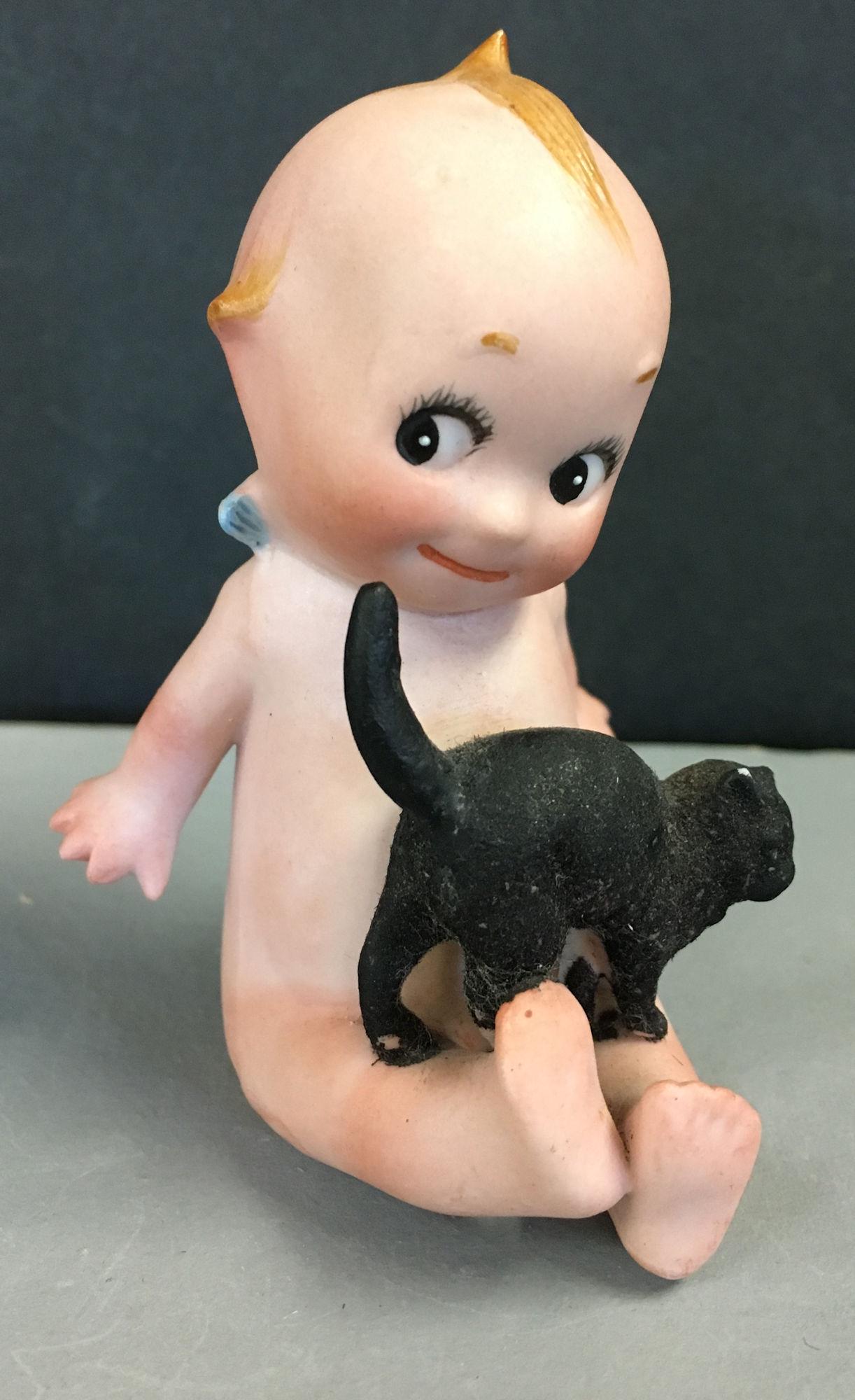 "KEWPIE WITH BLACK CAT ON HIS LAP." 3 ½" BISQUE (1 of 5)