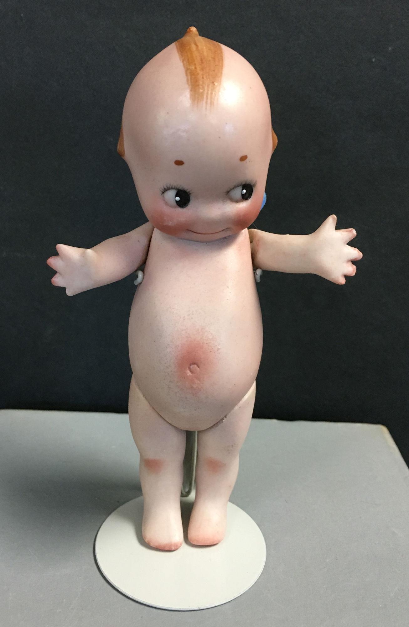 5" ALL BISQUE JOINTED KEWPIE. ONE PIECE HEAD AND TORSO, (1 of 2)