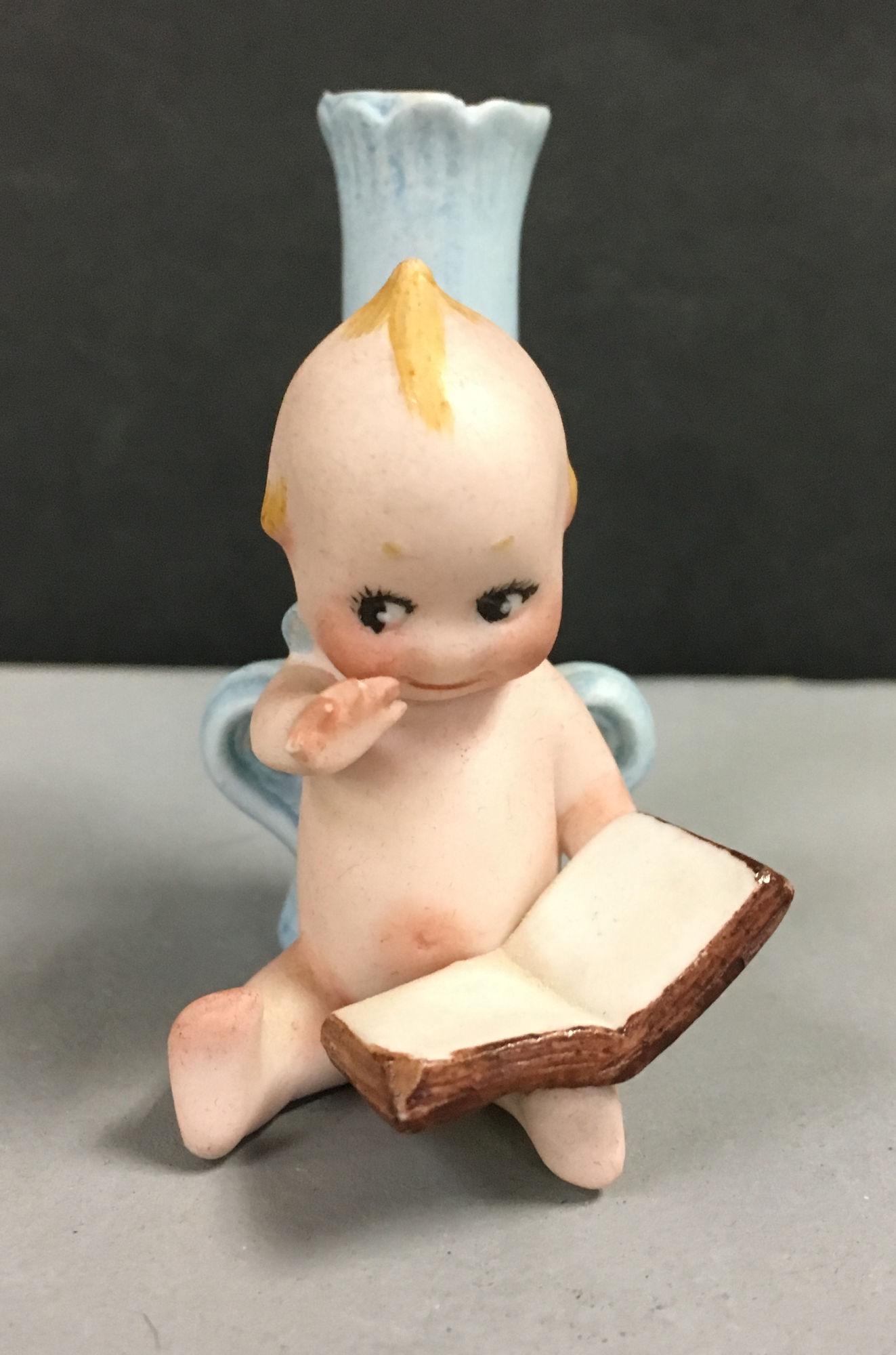 KEWPIE READING A BOOK BUD VASE/PLACE CARD HOLDER. (1 of 4)