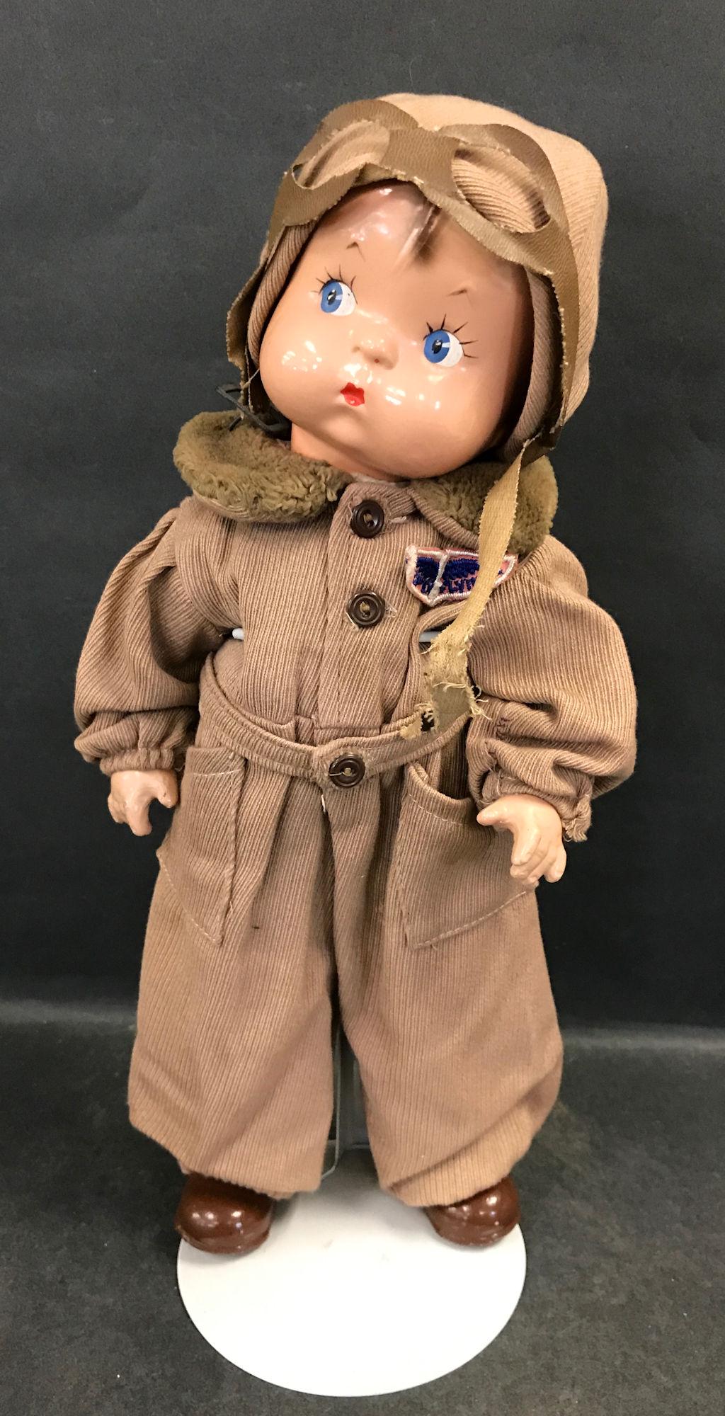 14" COMPOSITION EFFANBEE "SKIPPY" AVIATOR. MOLDED AND: 14" COMPOSITION EFFANBEE "SKIPPY" AVIATOR. MOLDED AND PAINTED HEAD, ON CLOTH BODY WITH COMPOSITION ARMS AND LOWER LEGS. DRESSED IN ORIGINAL AVIATOR UNIFORM.