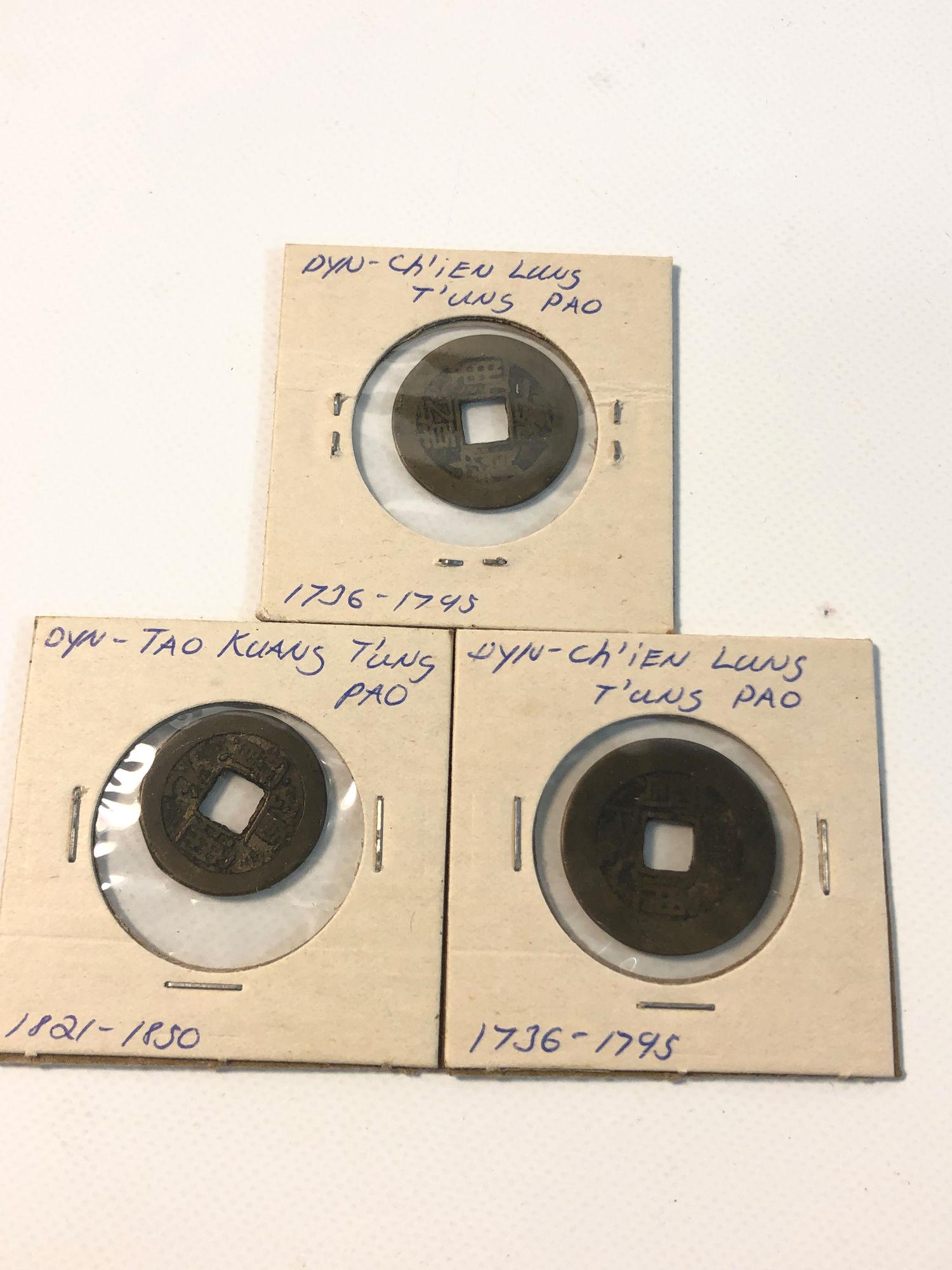 LOT OF ANTIQUE CHINESE COINS/TOKENS: LOT OF ANTIQUE CHINESE COINS/TOKENS ~ FROM THE 1700'S AND 1800'S. KUANG AND CH'IEN T'UNG PAOS. THREE TOTAL. NOT GRADED. IN SLEEVES.