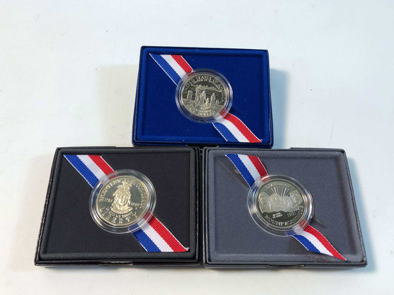 THREE SILVER PROOF COINS (1 of 7)