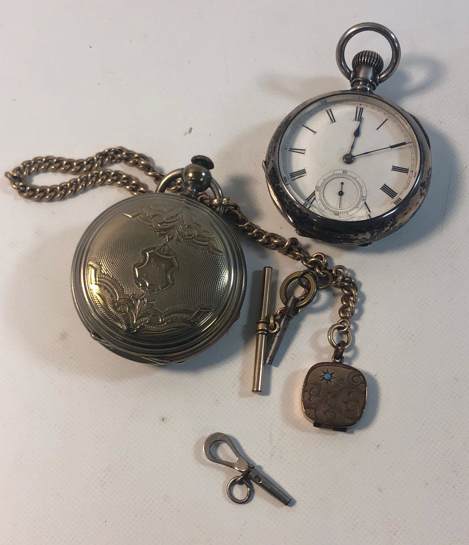 LOT OF TWO VINTAGE POCKET WATCHES: LOT OF TWO VINTAGE POCKET WATCHES ~ BOURQUIN SIZE 18S WITH 15-JEWEL MOVEMENT CIRCA 1874 (WINDS, SETS, AND TICKS AT TIME OF LISTING) FT. KEY WIND MOVEMENT NUMBERED 15364 (ON GOLD-FILLED FOB/CHAIN). ILL