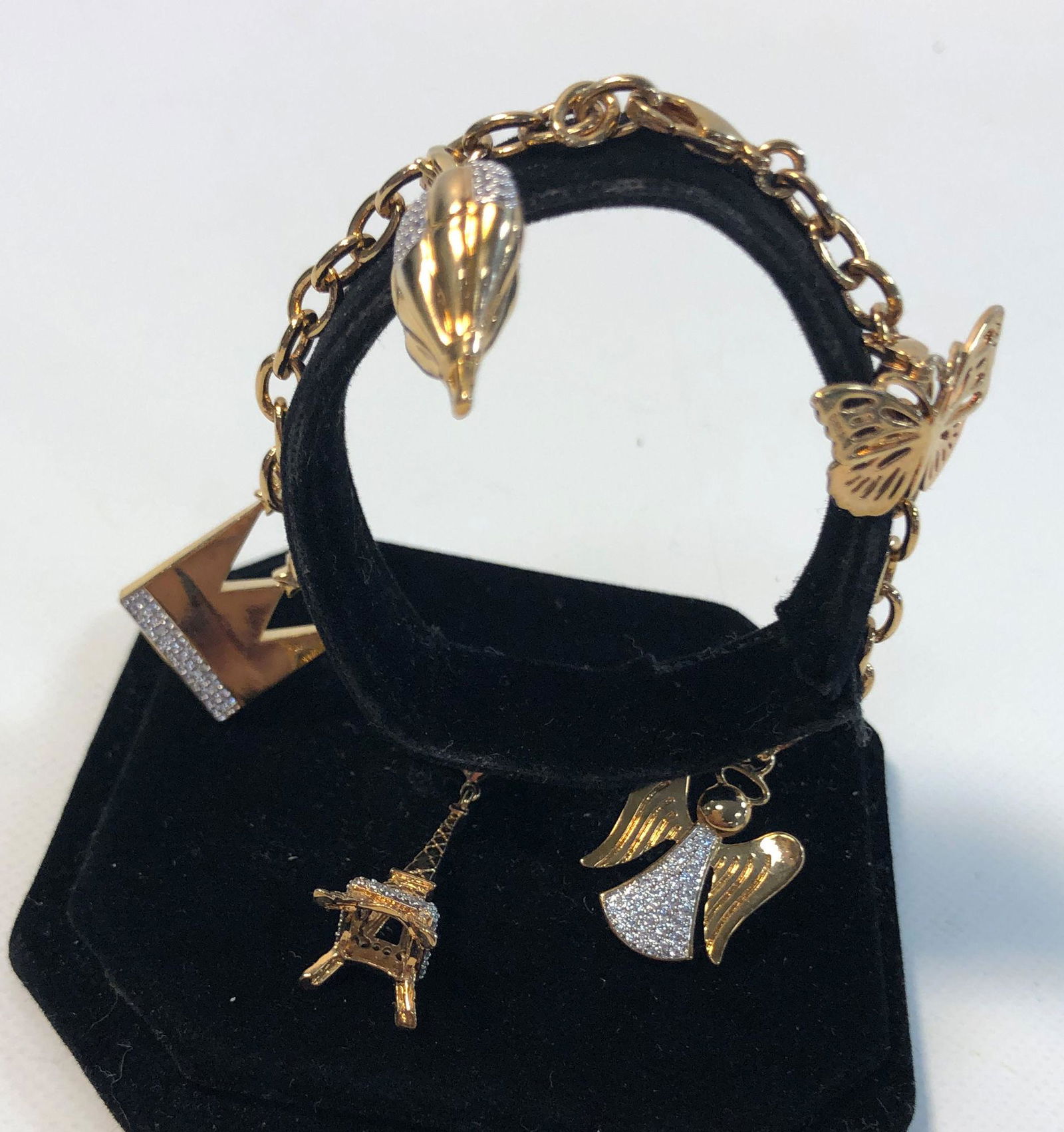 GOLD TONE METAL CHARM BRACELET (1 of 6)