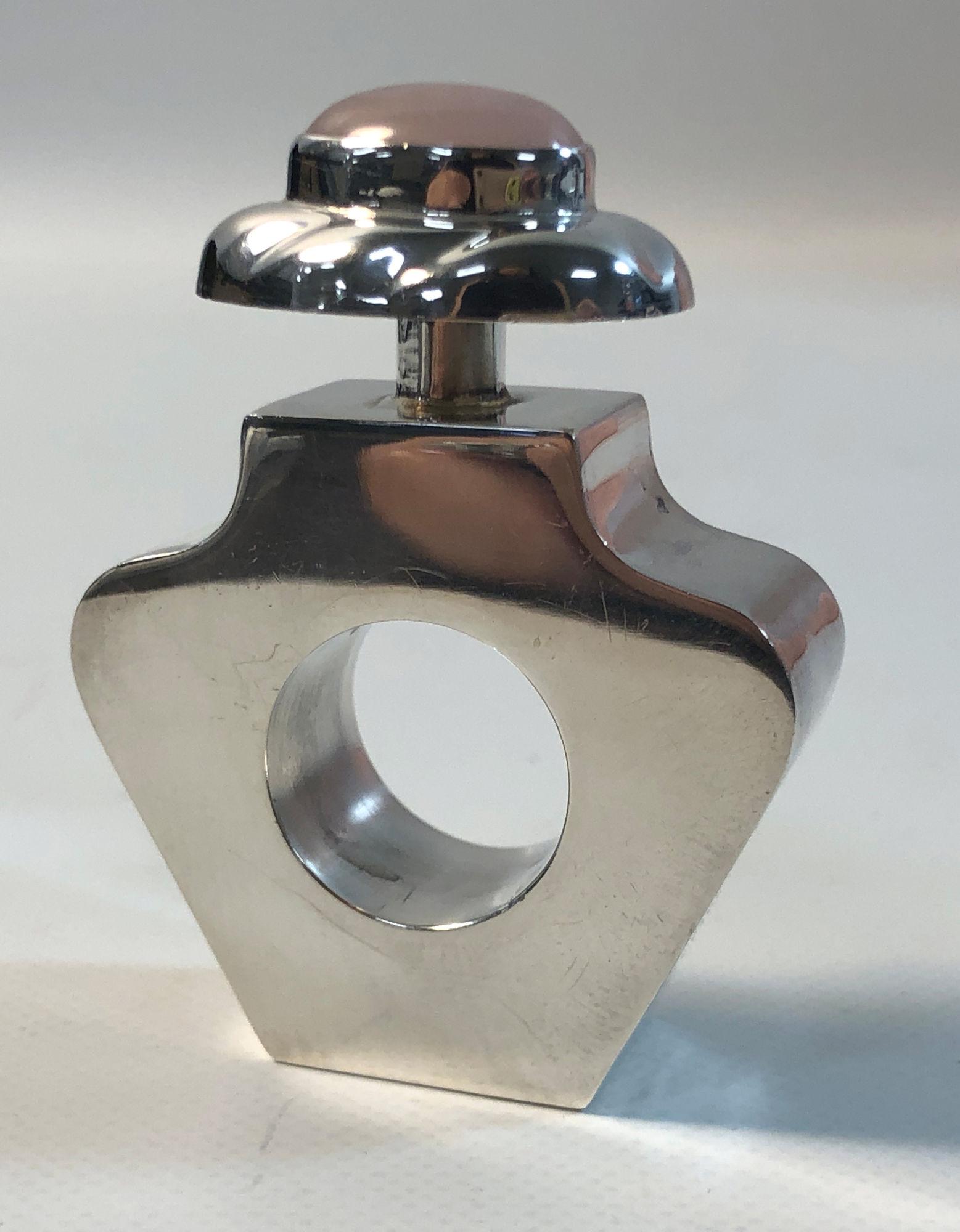 SILVER PERFUME BOTTLE: SILVER PERFUME BOTTLE ~STERLING SILVER (STAMPED AND TESTED). MEXICO MADE. 2.5" X 1.75". TOPPED WITH A BEZEL SET ROSE QUARTZ CABOCHON. TAPERED DESIGN. POLISHED FINISH. 1.58 TROY OUNCES TW.