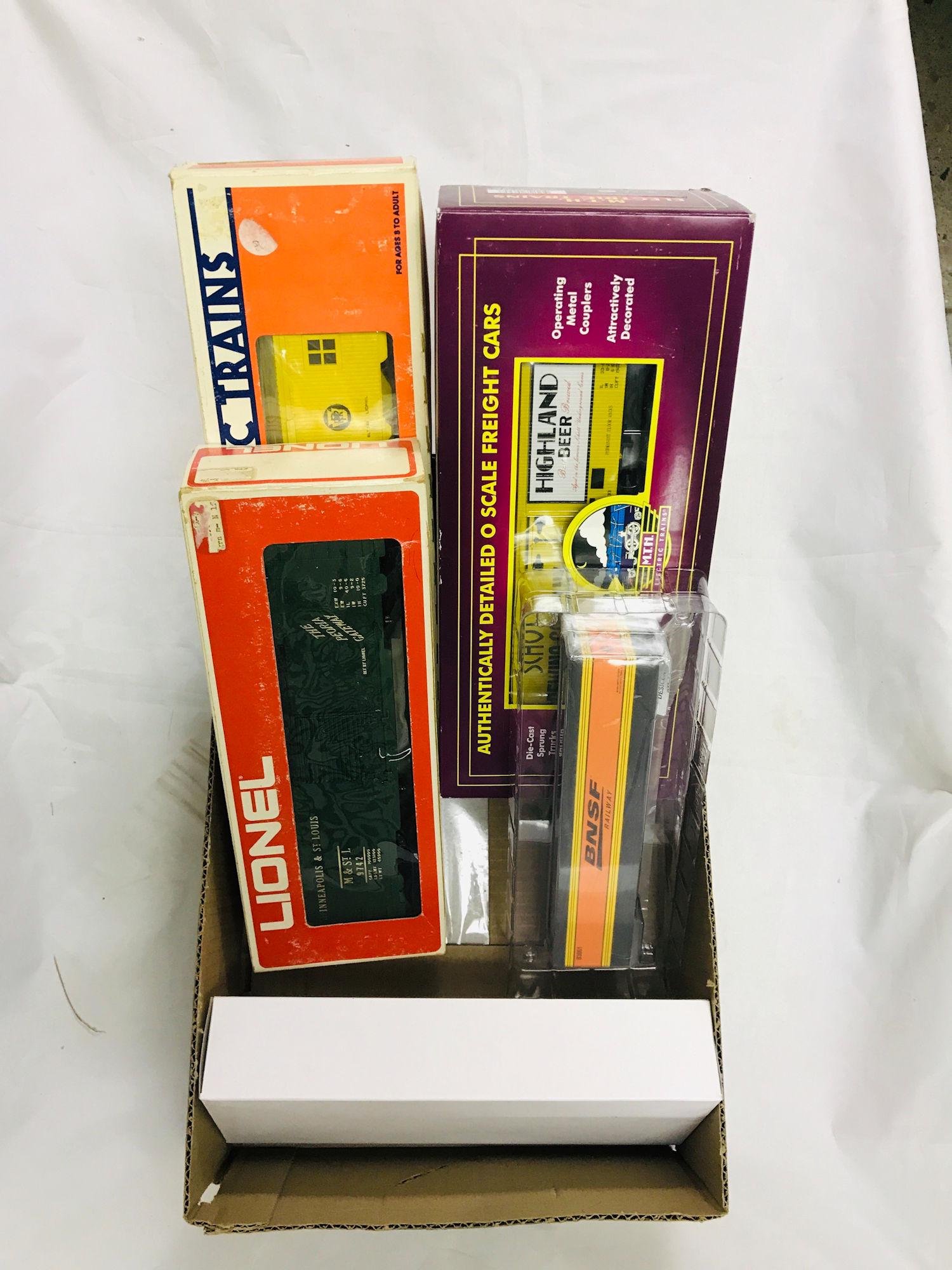 BOX LOT INCLUDING LIONEL O GAUGE 9742 M&STL BOX CAR,: BOX LOT INCLUDING LIONEL O GAUGE 9742 M&STL BOX CAR, 5724 PRR ILUMINATED BUNK CAR, 83861 BNSF CUSTOM CONTAINER AND MTH 20-94363 SCHOTT BREWING REEFER, ALL IN BOXES.