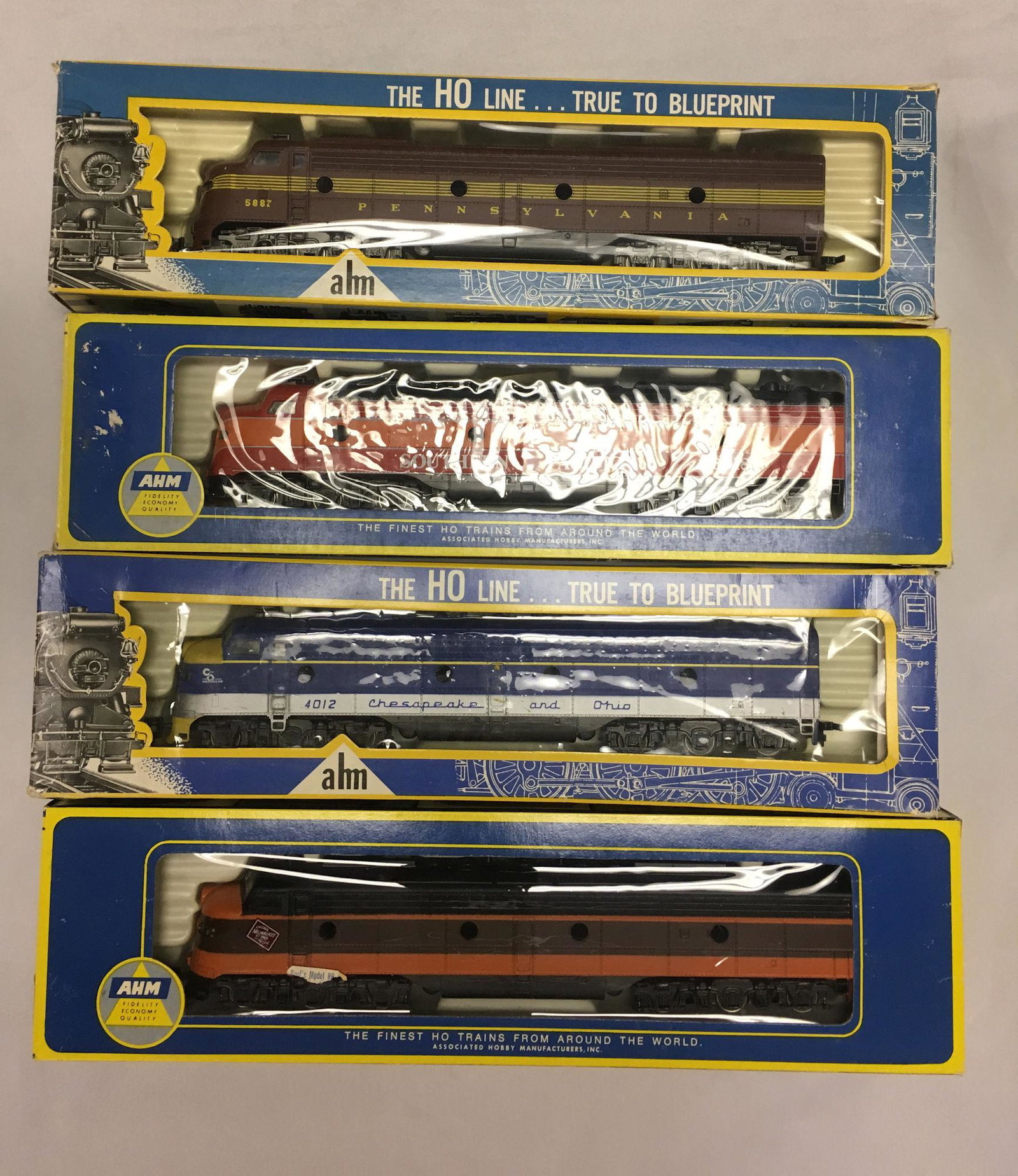 LOT 4 AHM HO GAUGE G.M. DIESEL LOCOMOTIVES - (3) #5121,: LOT 4 AHM HO GAUGE G.M. DIESEL LOCOMOTIVES - (3) #5121, #5123. IN ORIGINAL BOXES