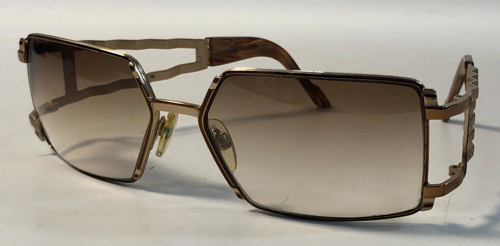 CAZEL SUNGLASSES: CAZEL SUNGLASSES ~ OMBRE BROWN LENSES, CRIMPED STYLE ARMS W/ CLEAR RHINESTONE ACCENTS, SUNGLASSES SLIGHTLY DAMAGED WITH MINOR SCRATCHES TO LENSES AND MINOR OXIDATION AROUND FRAMES, TRAVEL CASE INCLUDE