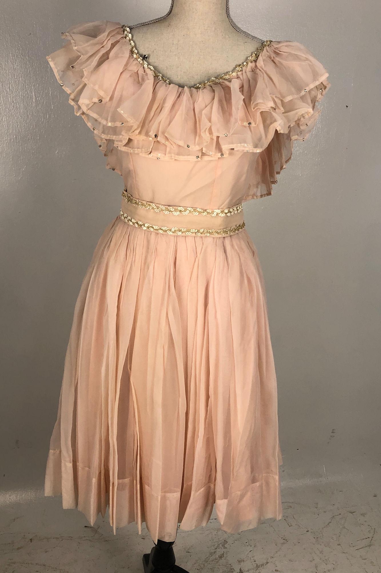 VINTAGE COSTUME WORN BY THE COLLINS SISTERS: VINTAGE COSTUME WORN BY THE COLLINS SISTERS ~ CUSTOM HANDMADE BALLERINA PINK DRESS, A-LINE DRESS W/ RUFFLED SWEETHEART NECKLINE, CLEAR RHINESTONE AND WHITE SEQUIN ACCENTS, MATCHING BELT INCLUDED APPRO