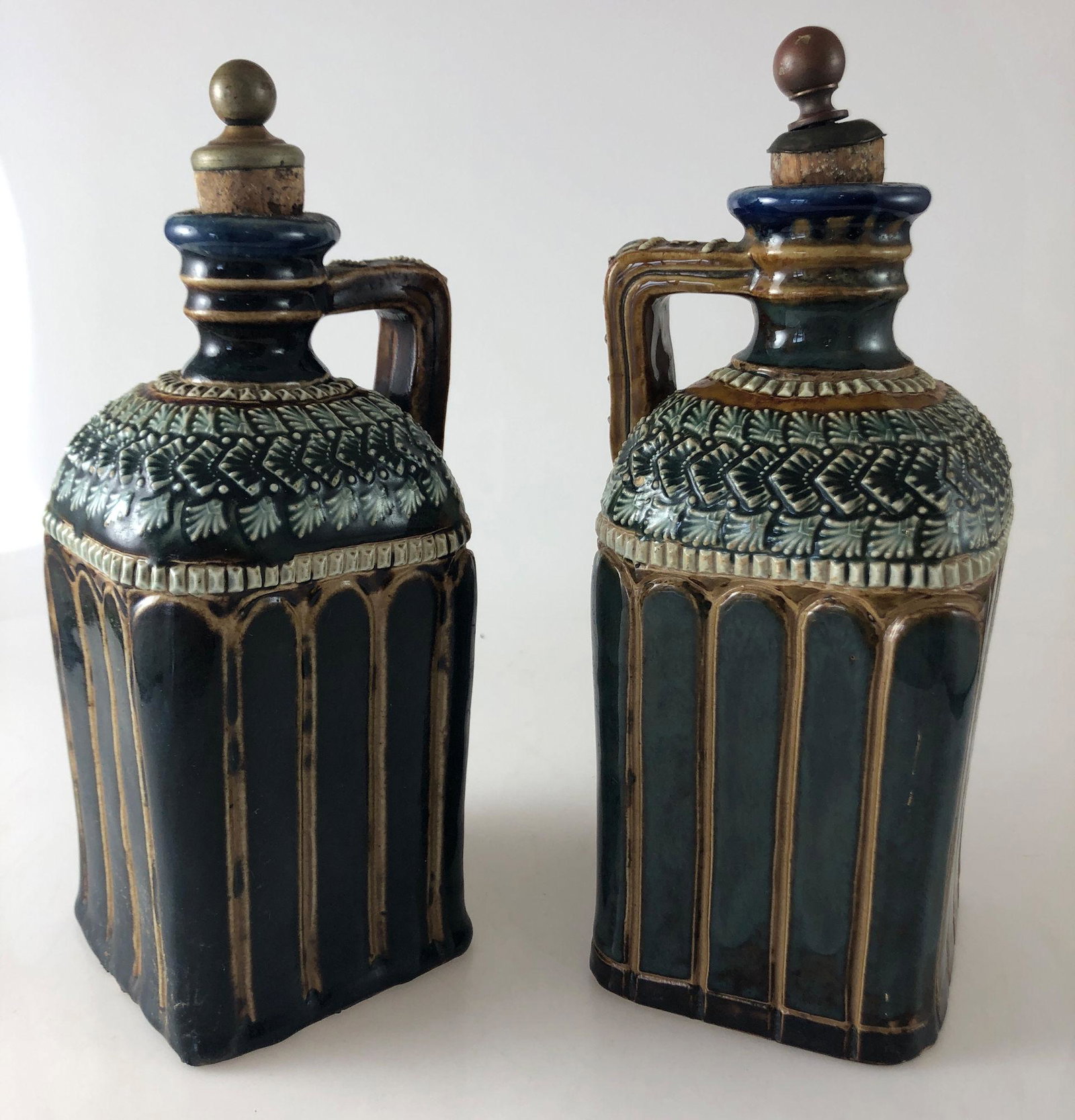 PAIR DOULTON LAMBETH LIQUOR BOTTLES 9", ONE MARKED "B",: PAIR DOULTON LAMBETH LIQUOR BOTTLES 9", ONE MARKED "B", ONE MARKED "G"