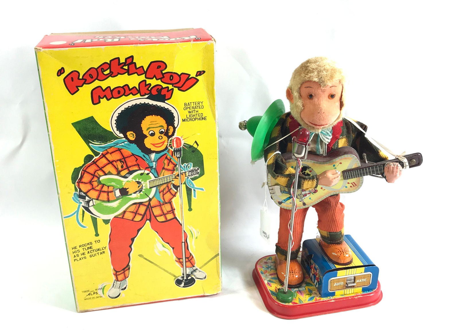 ALPS BATTERY OPERATED "ROCK'N ROLL" MONKEY, WITH: ALPS BATTERY OPERATED "ROCK'N ROLL" MONKEY, WITH ORIGINAL BOX, MADE IN JAPAN, 11.5"